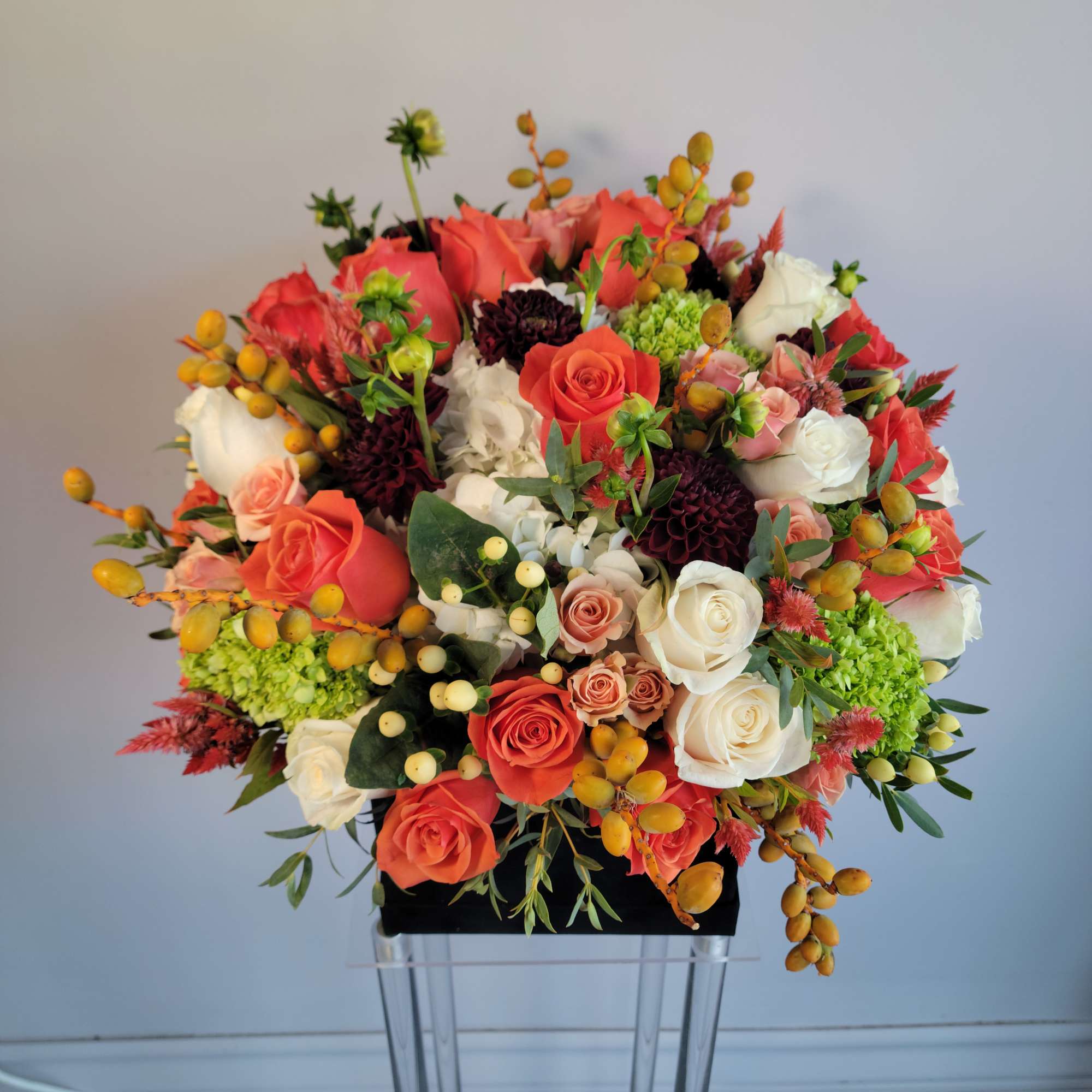 The name reflects the vibrant mix of warm oranges, soft peaches, and