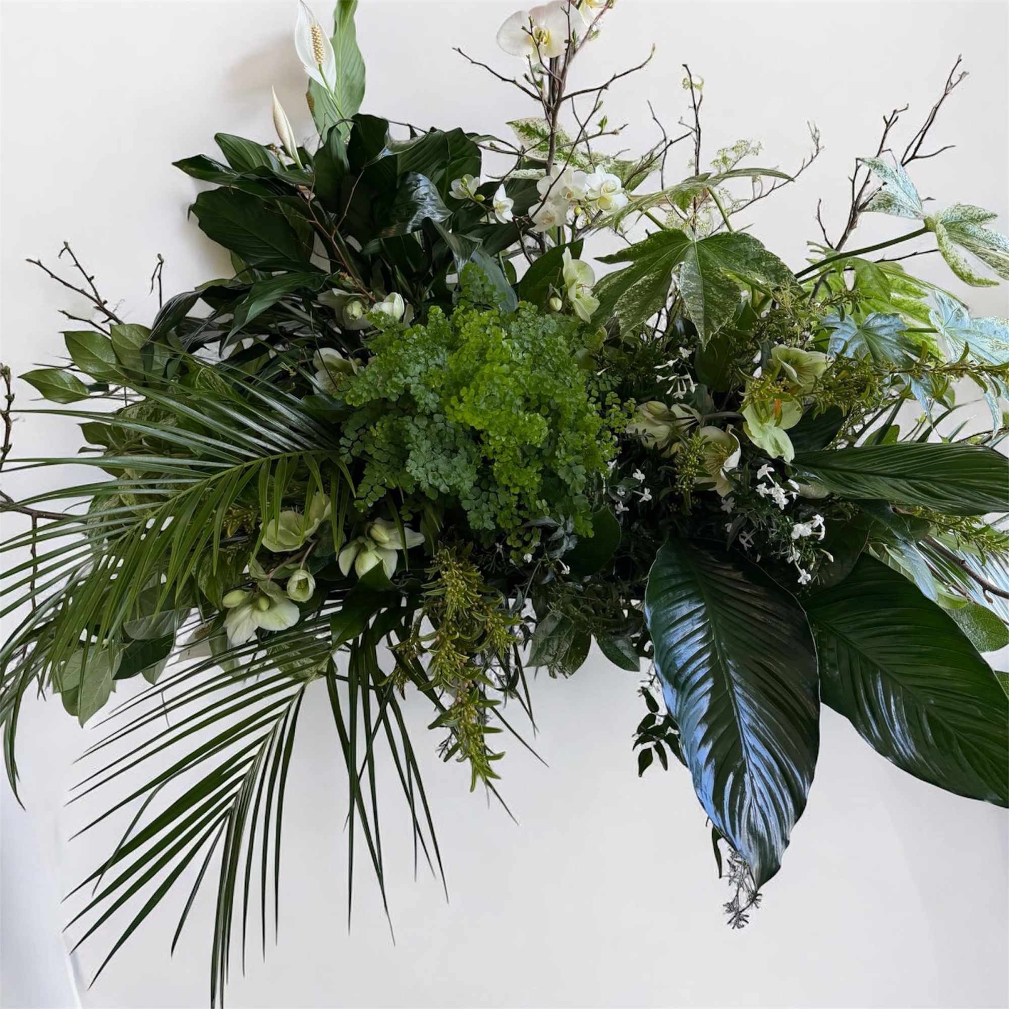 this beautiful ''luxury Caskey spray'' whit white orchid and Helleborus and mix