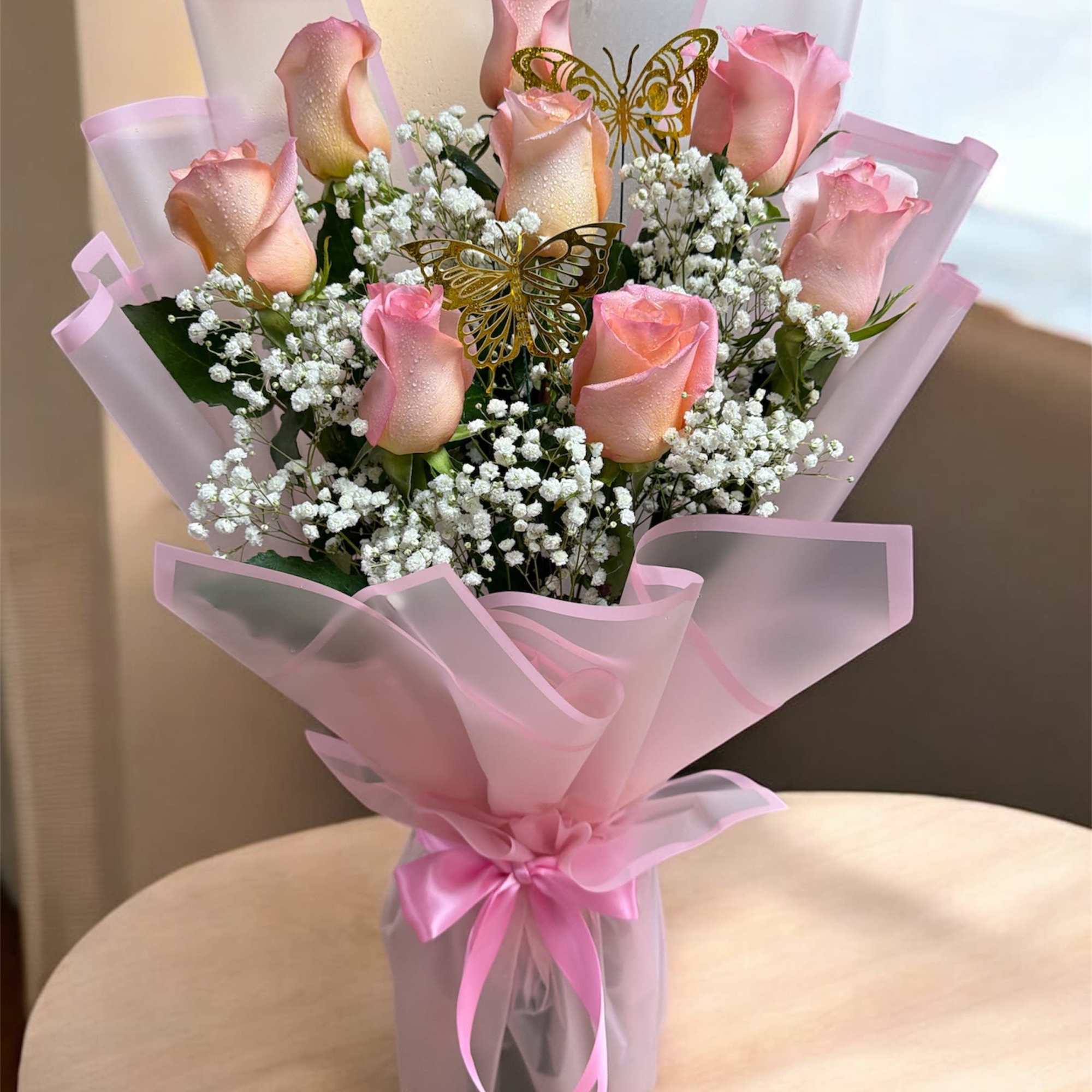 Beautiful arrangement of Pink Roses with oasis foam wrapped in Korean paper