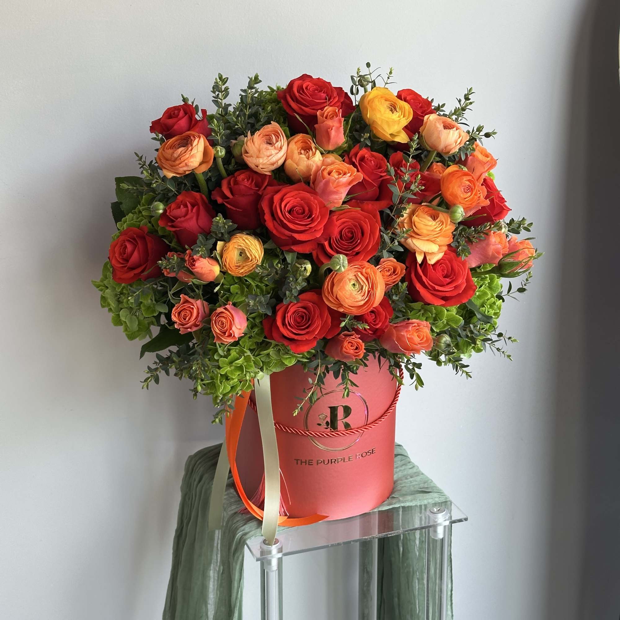 Deep orange and light orange flowers create a beautiful contrast in a