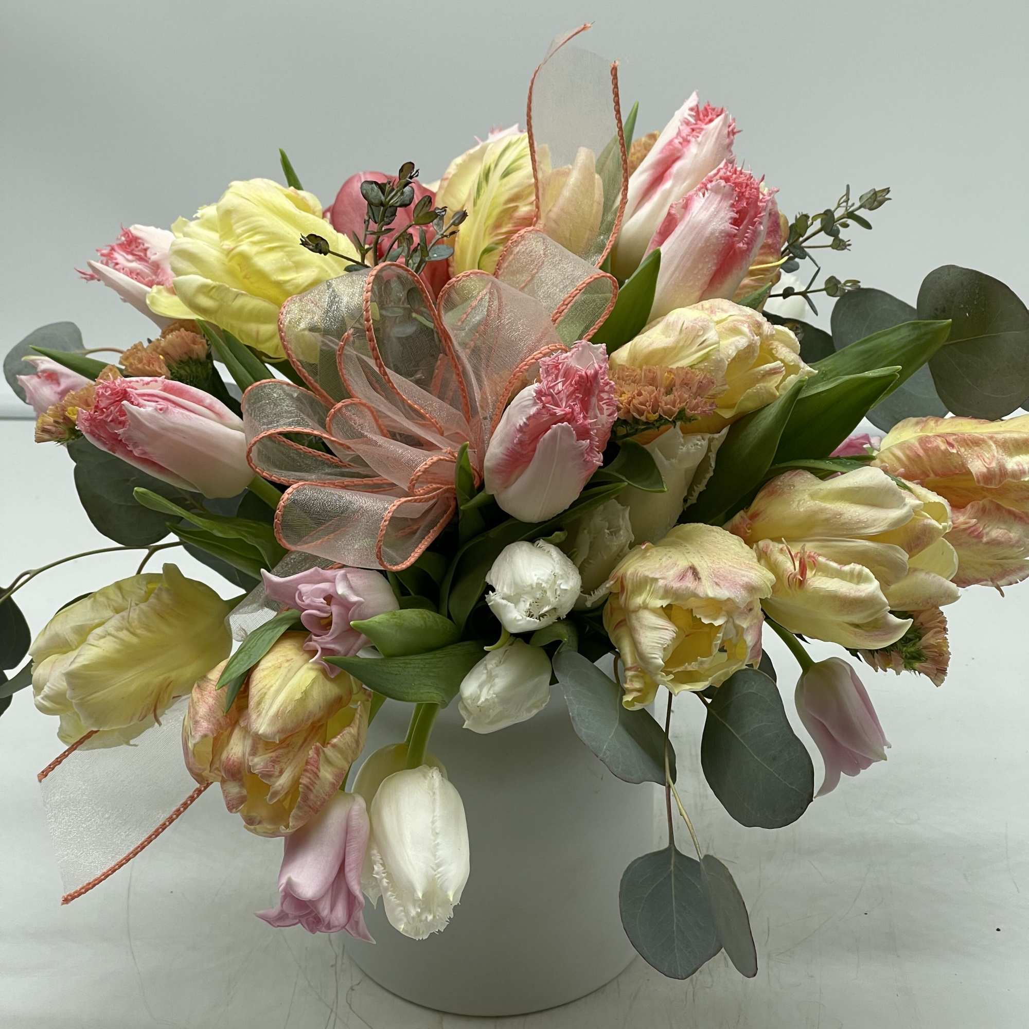 A vibrant arrangement of fresh tulips, showcasing the beauty of spring with