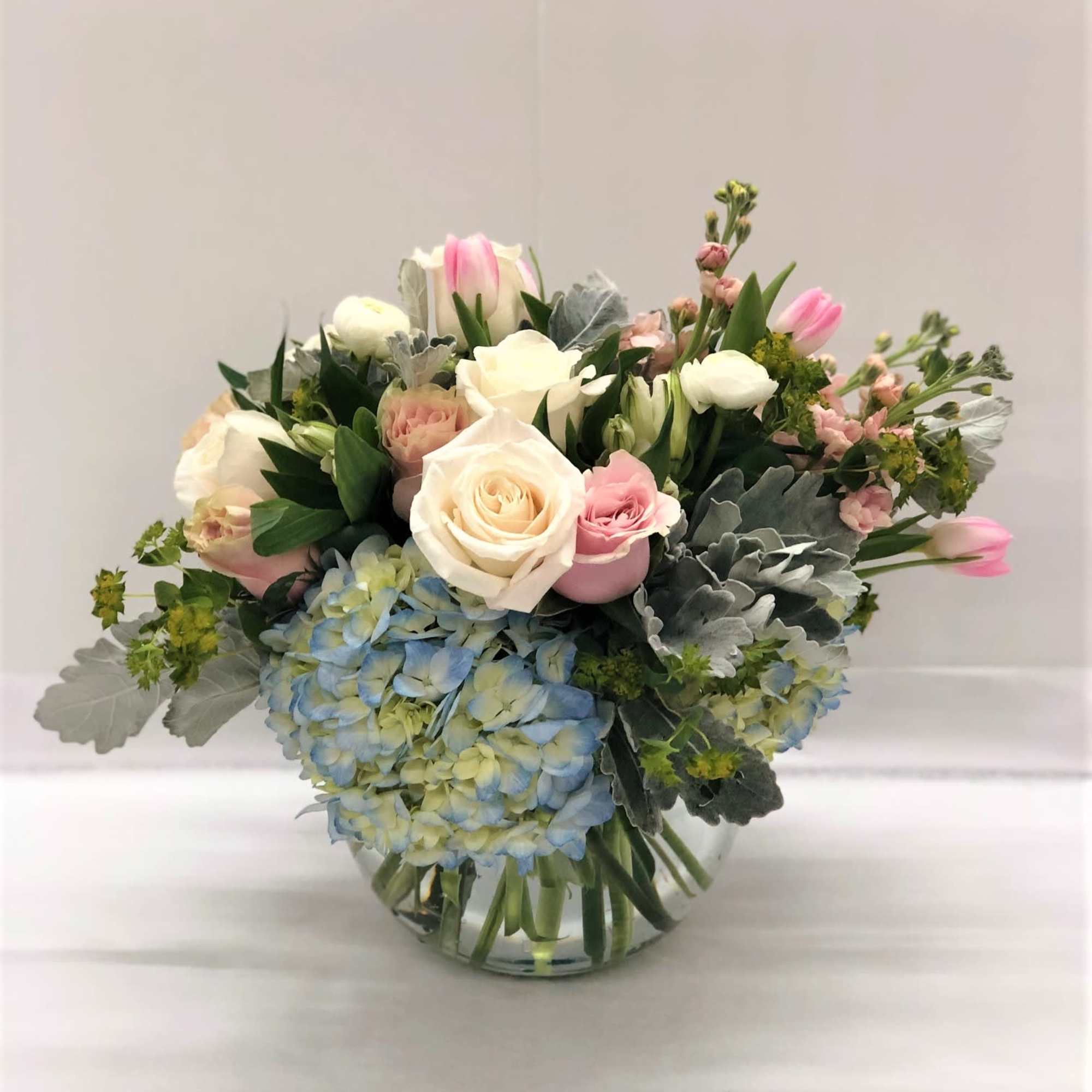 Love Hues is a soft and elegant bouquet featuring alstroemeria, roses, hydrangeas