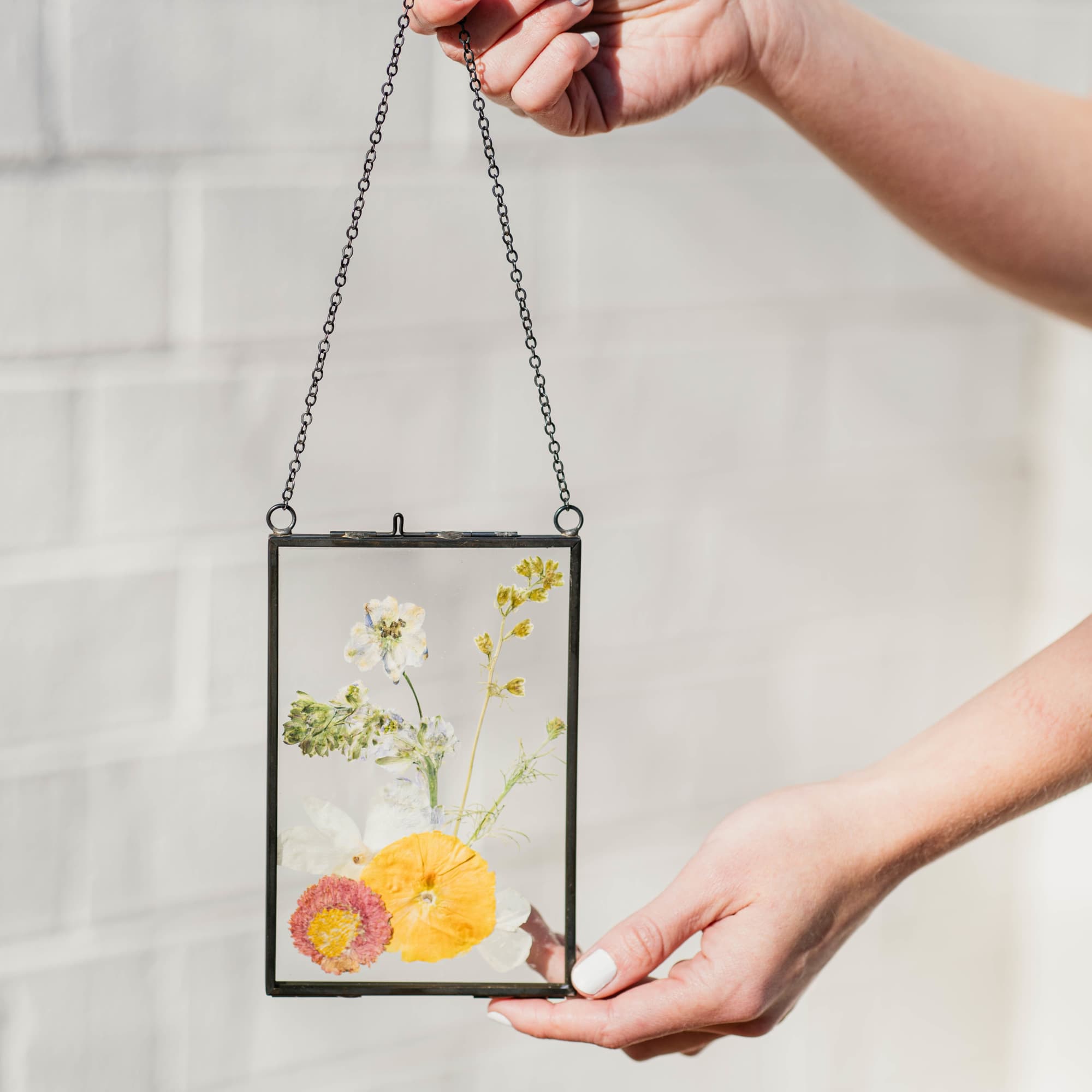 Capture the beauty of nature with our pressed flower frame, showcasing real