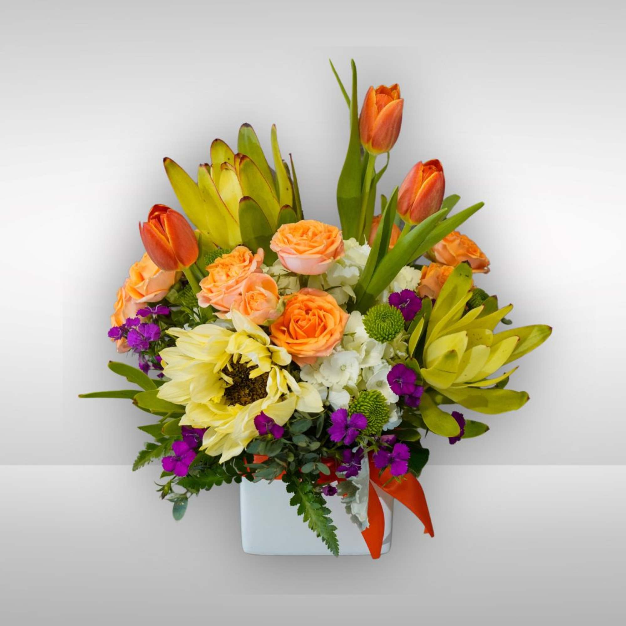 Recipe: Orange Tulips, Yellow Sunflower, Orange Spray Roses, Safari, White Hydrangeas, Green