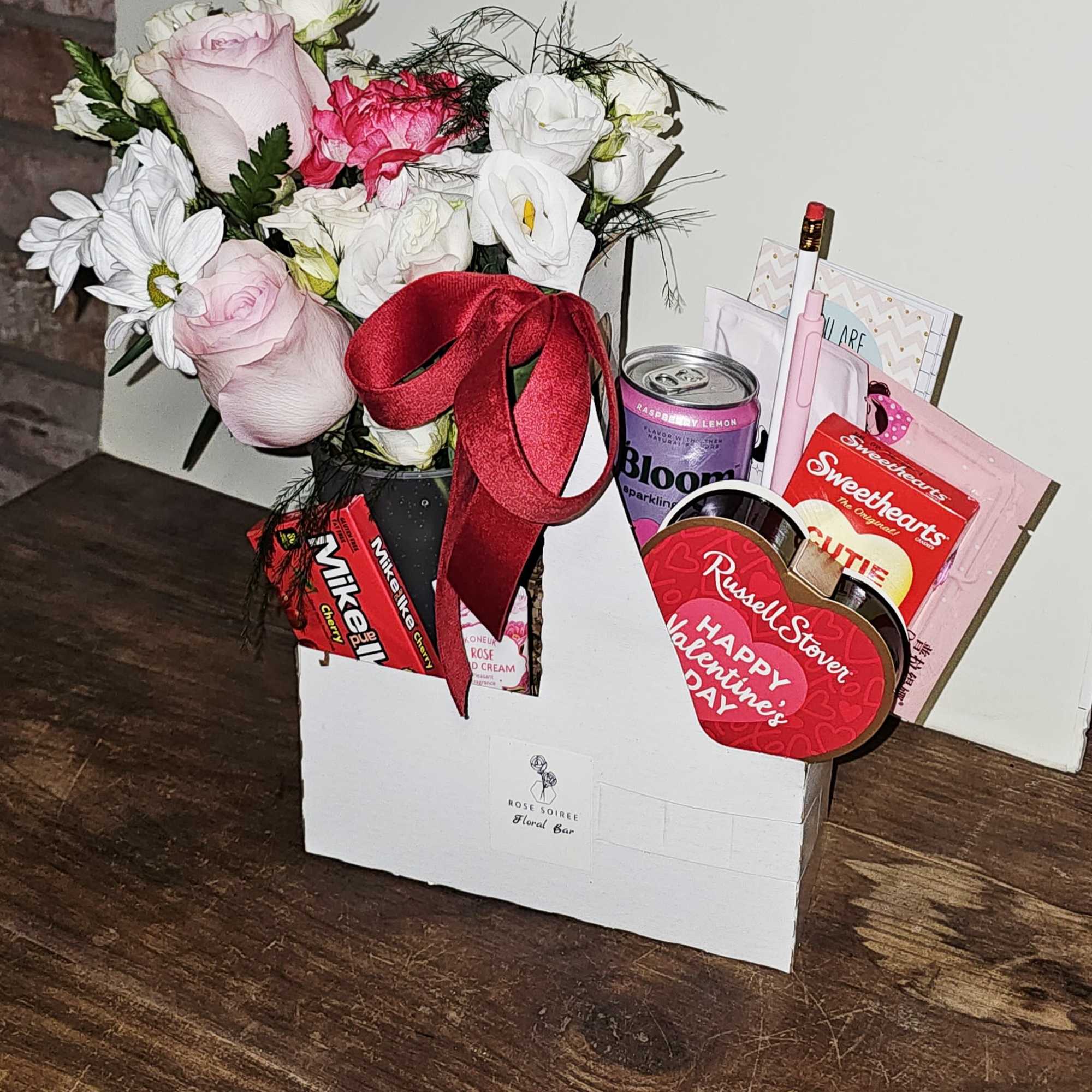 A cheerful mix of fresh florals, a light sip, and feel-good treats