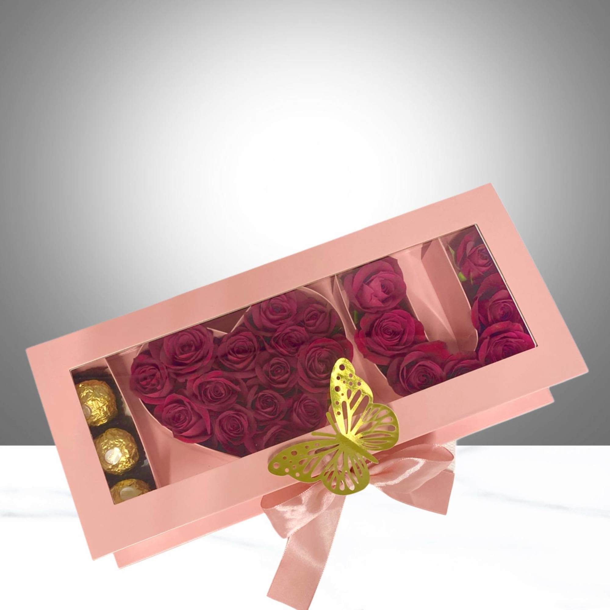 Pink box featuring the phrase &ldquo;I ️ You,&rdquo; with the word love