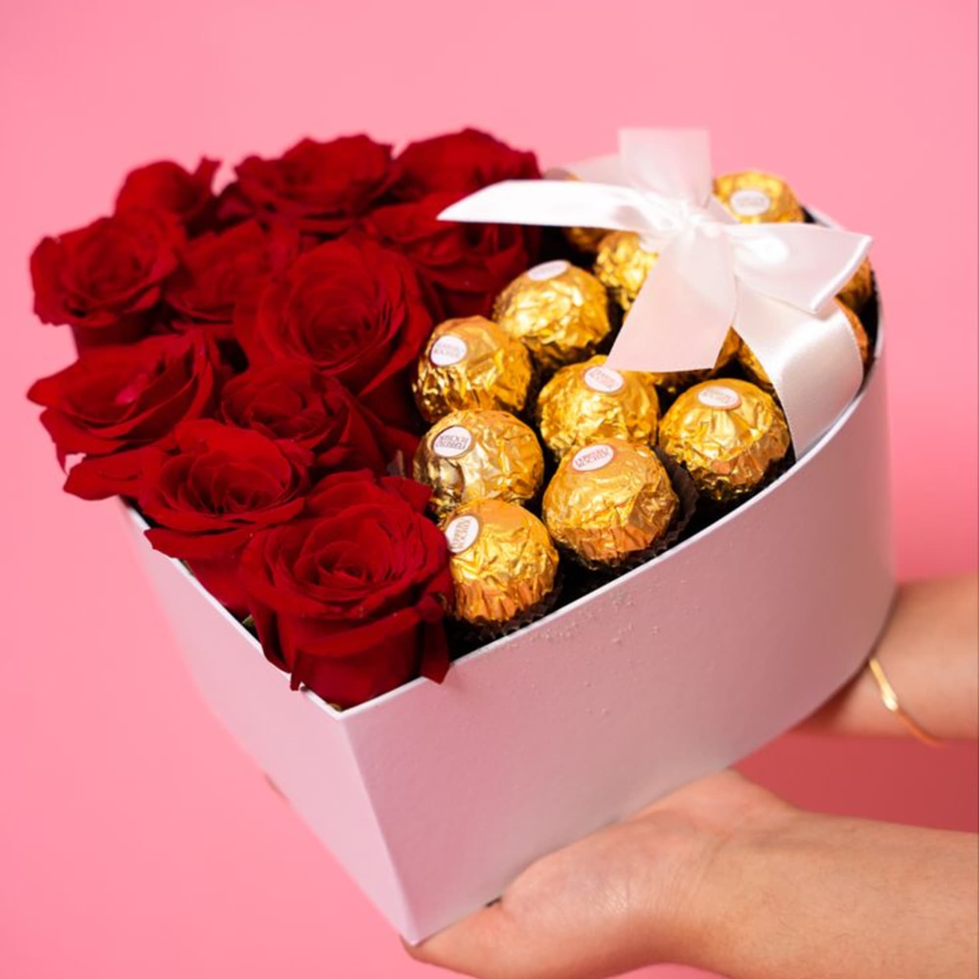 Beautiful heart shaped box with hazelnut chocolates and one half dozen lush