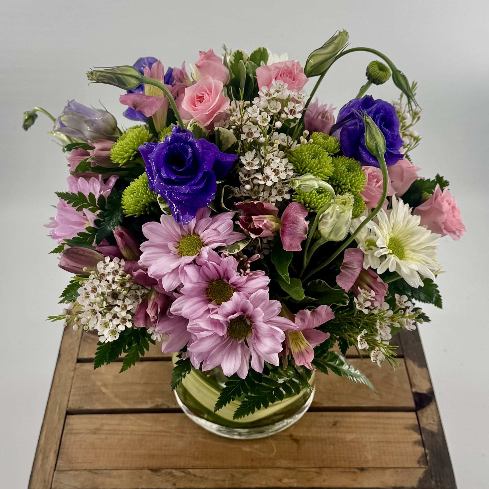 Introducing our Berry Bliss Floral Arrangement, a vibrant and charming display of