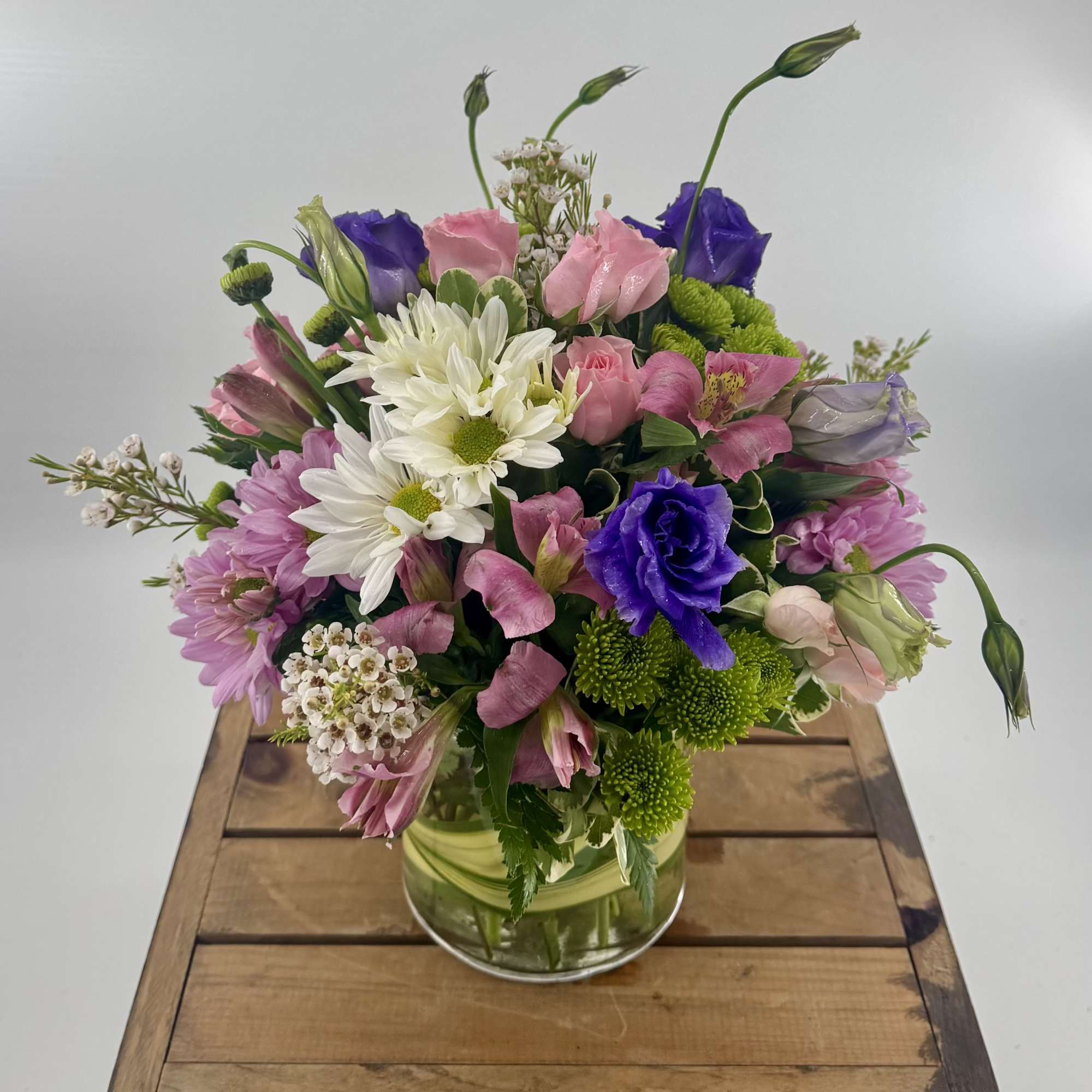 Introducing our Berry Bliss Floral Arrangement, a vibrant and charming display of