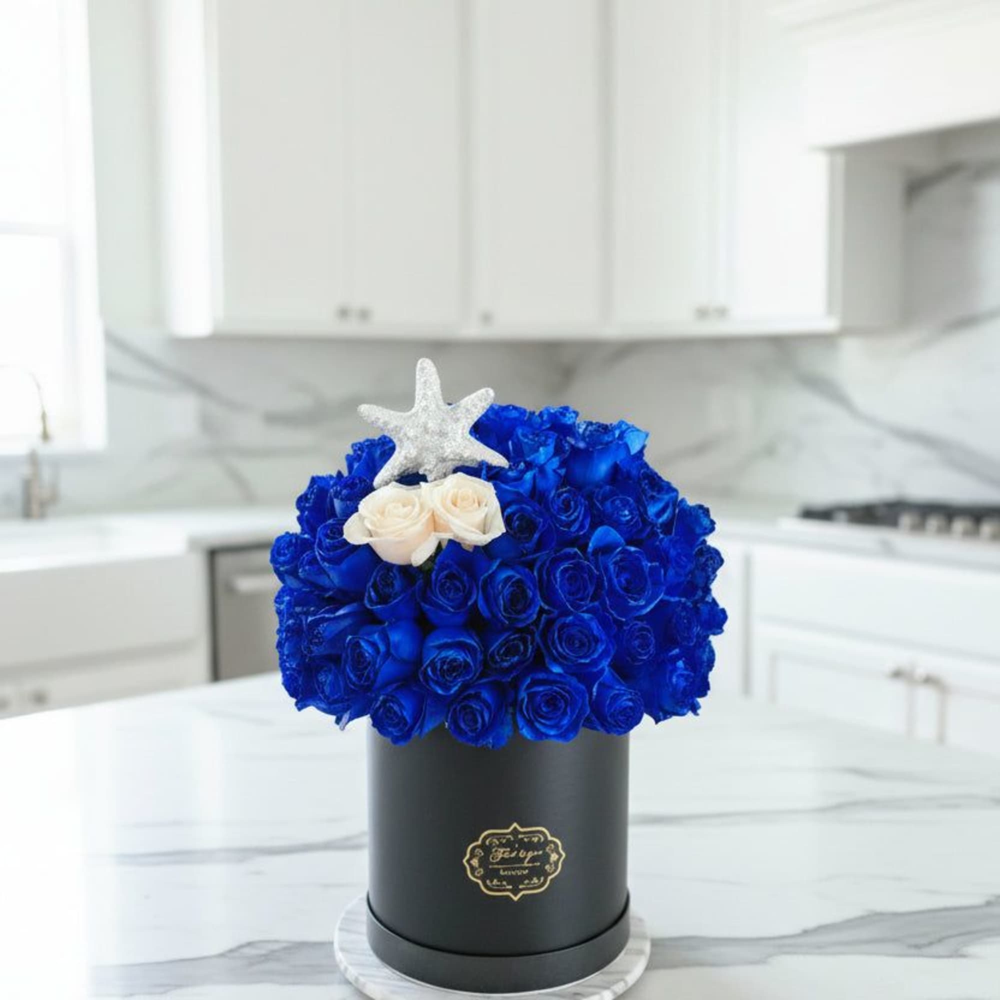 Beautiful Blue Flower Box designed by Yansa Flowers, a luxury florist creating