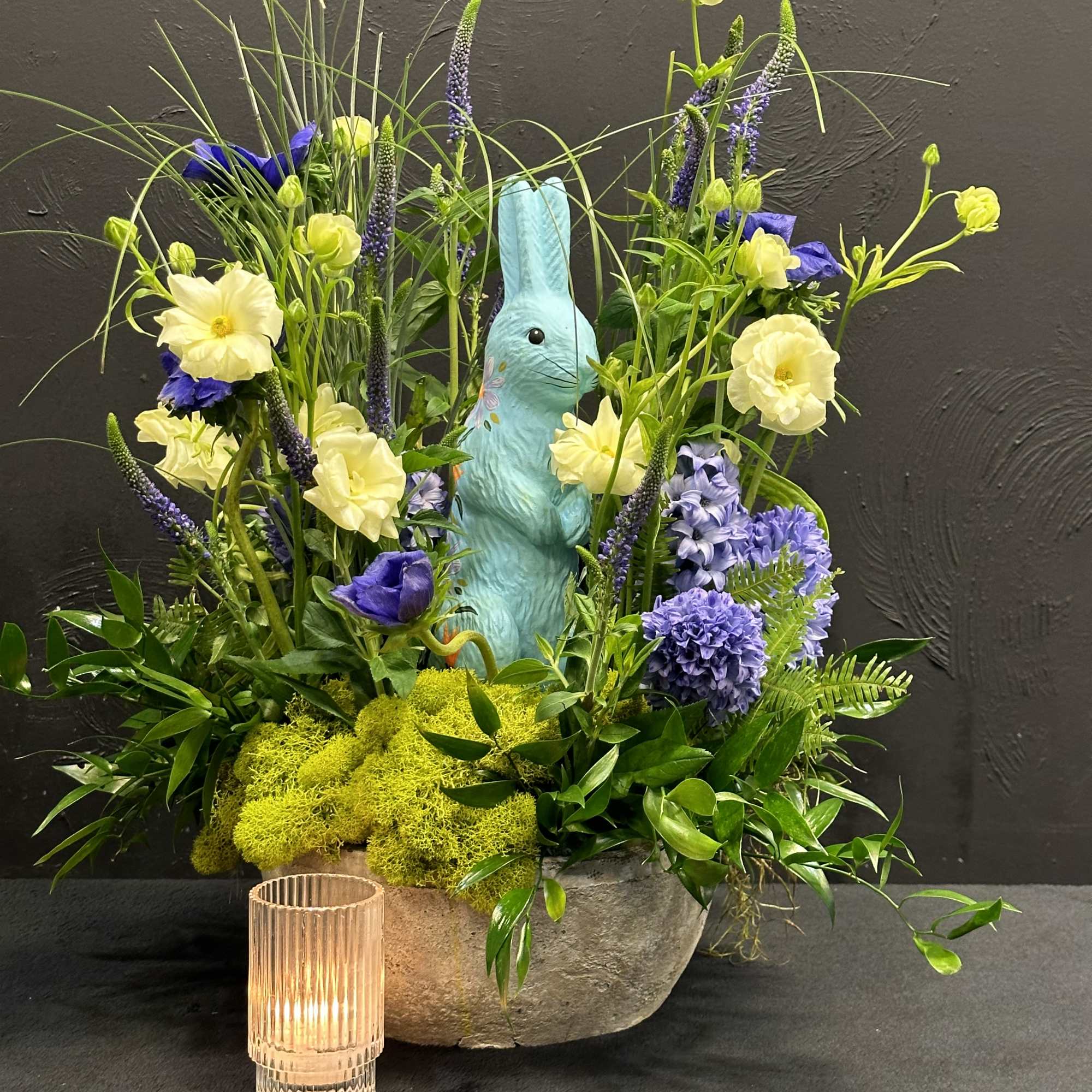 The Blue Bunny arrangement is a delightful composition of fresh blooms, This