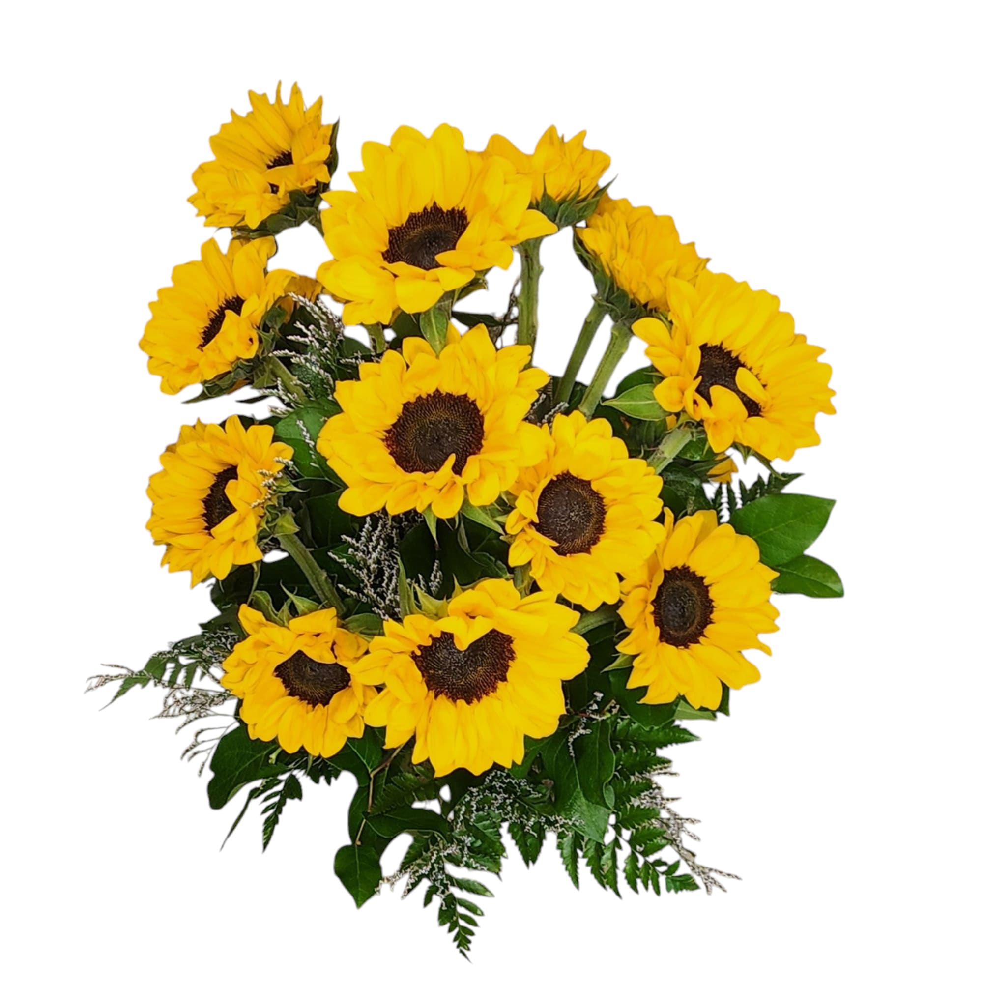 Sunflowers and a variety of greens in a glass vase. 