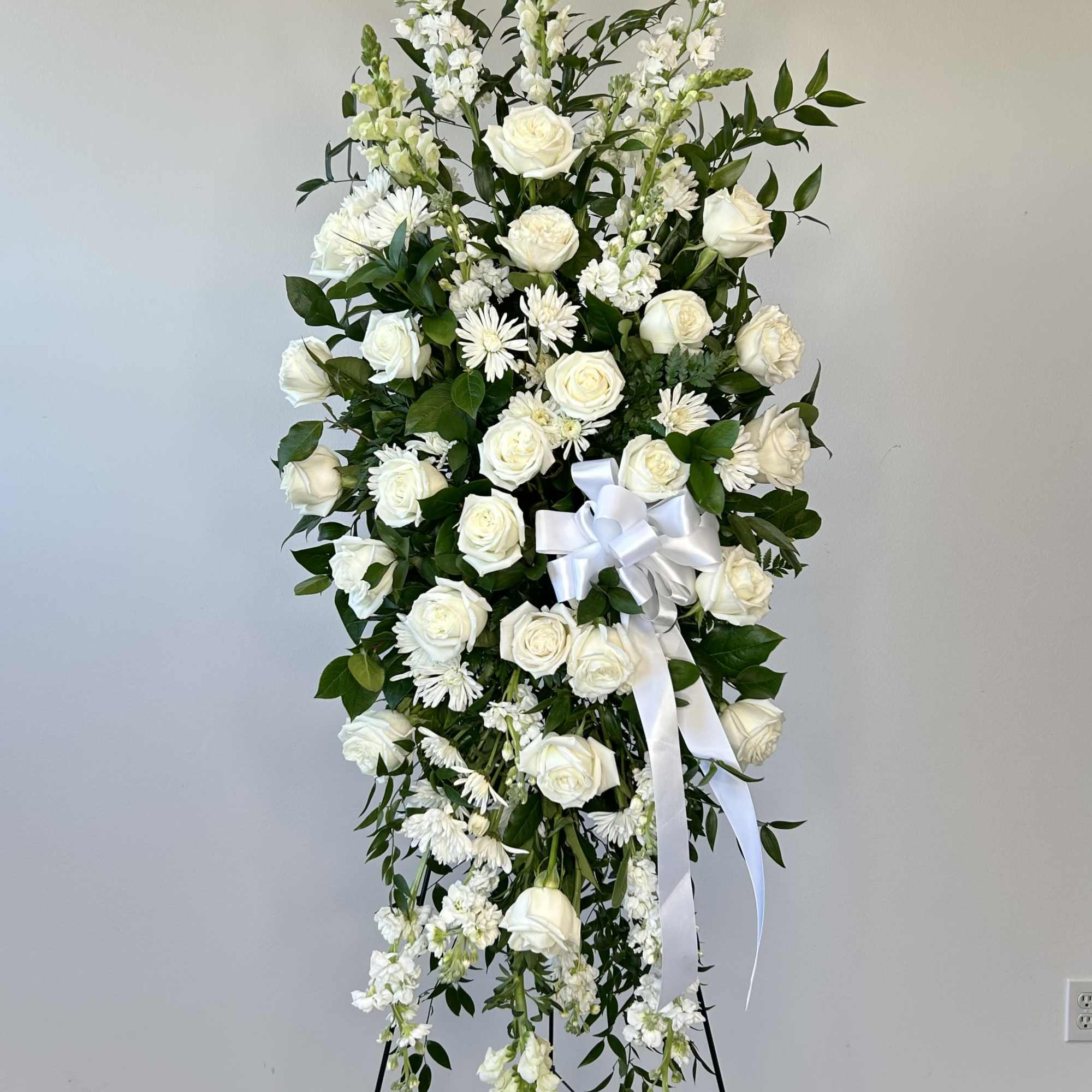 A tender elegy in blooms graces IrvineVillageFlowers.com, crafted for those whose hearts