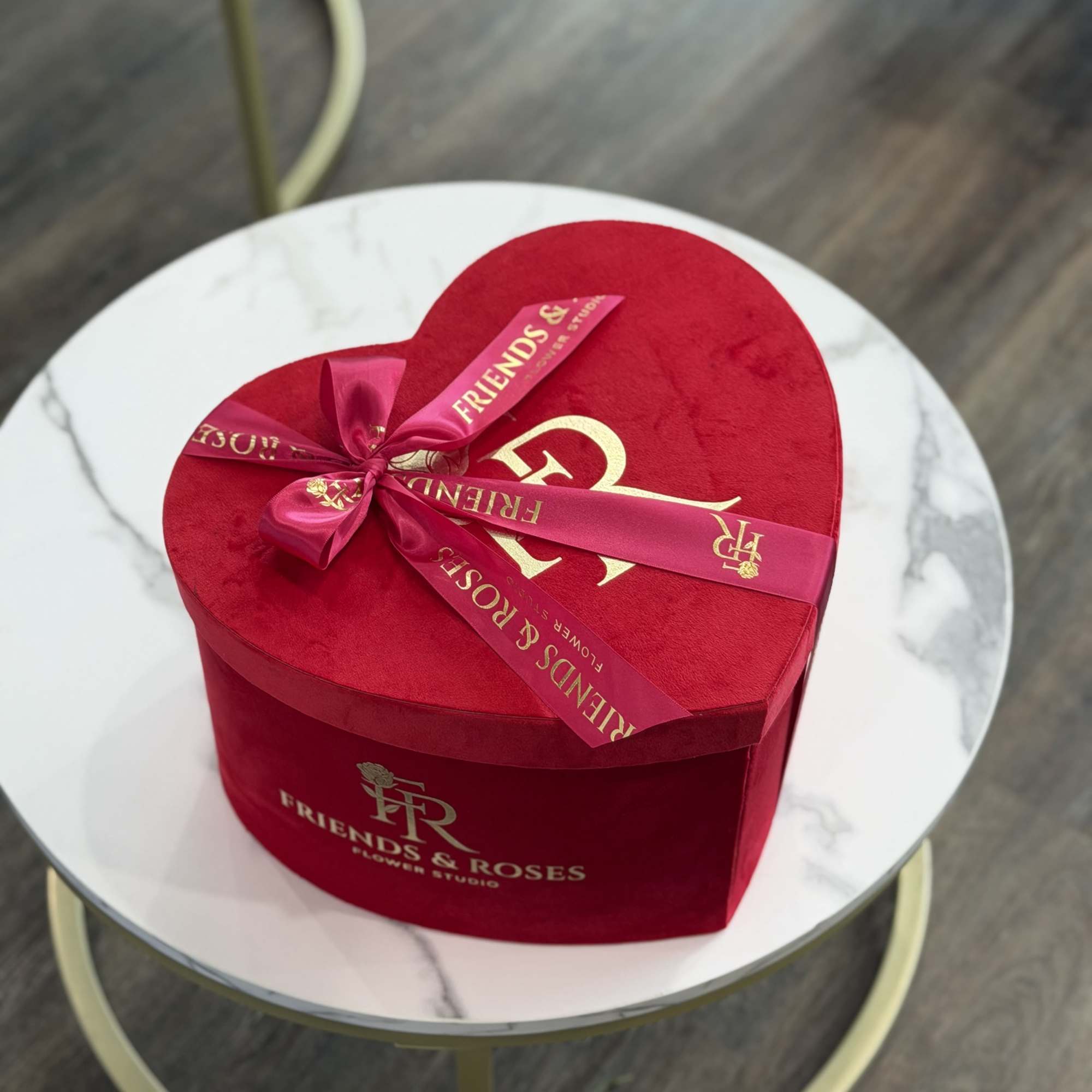 A delicate harmony of creamy ivory and soft blush roses, thoughtfully arranged