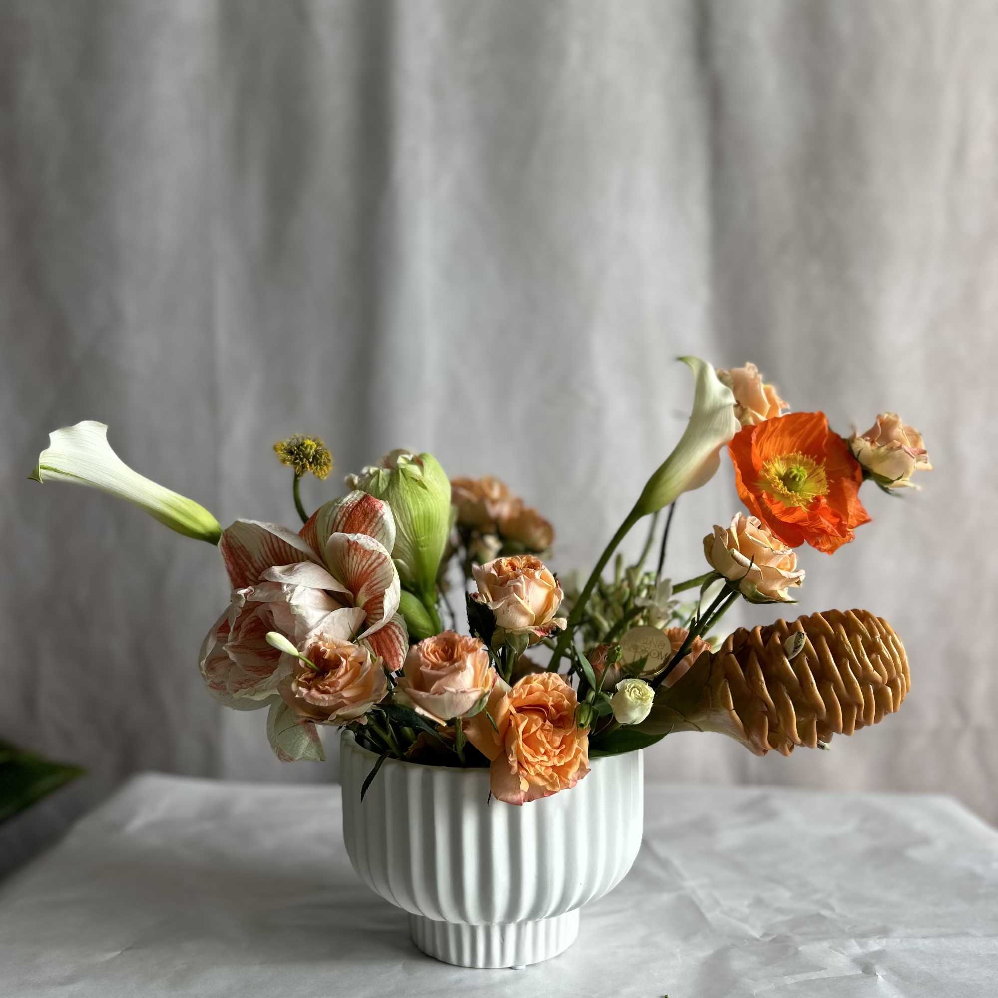 Ginger, poppies, amaryllis, roses and lillies
If orange is your vibe, this is