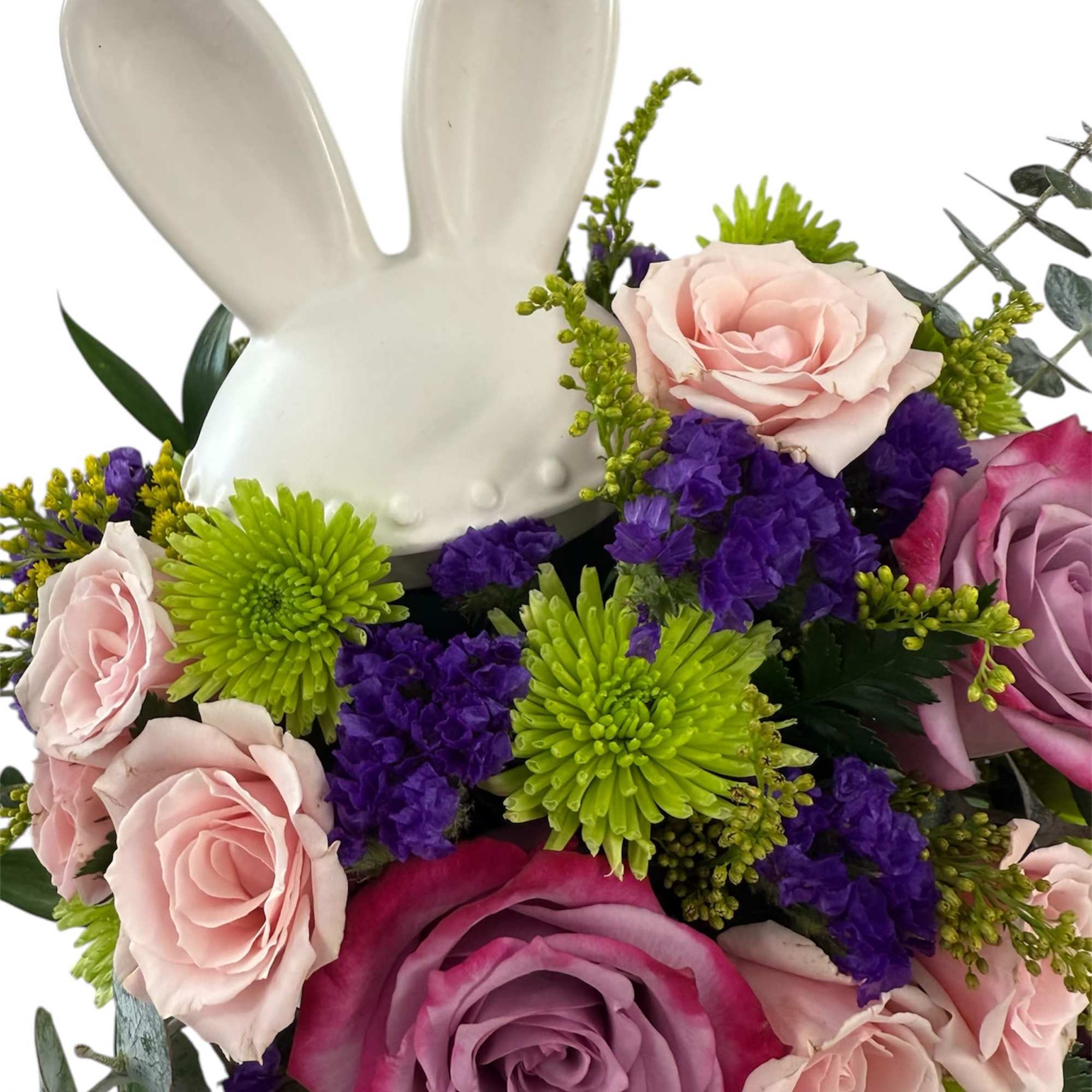 A beautiful floral arrangement design in a keepsake candy jar, perfect for