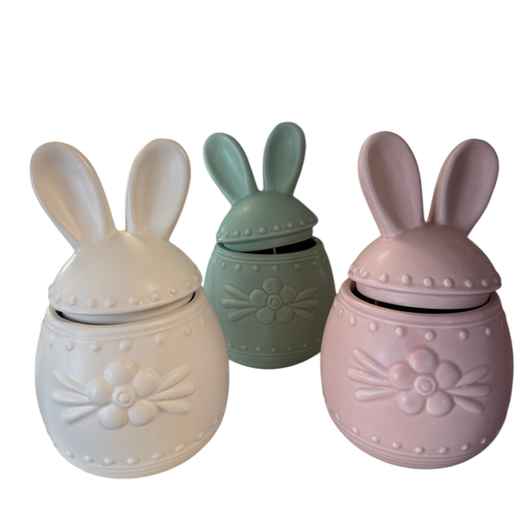 A beautiful floral arrangement design in a keepsake candy jar, perfect for