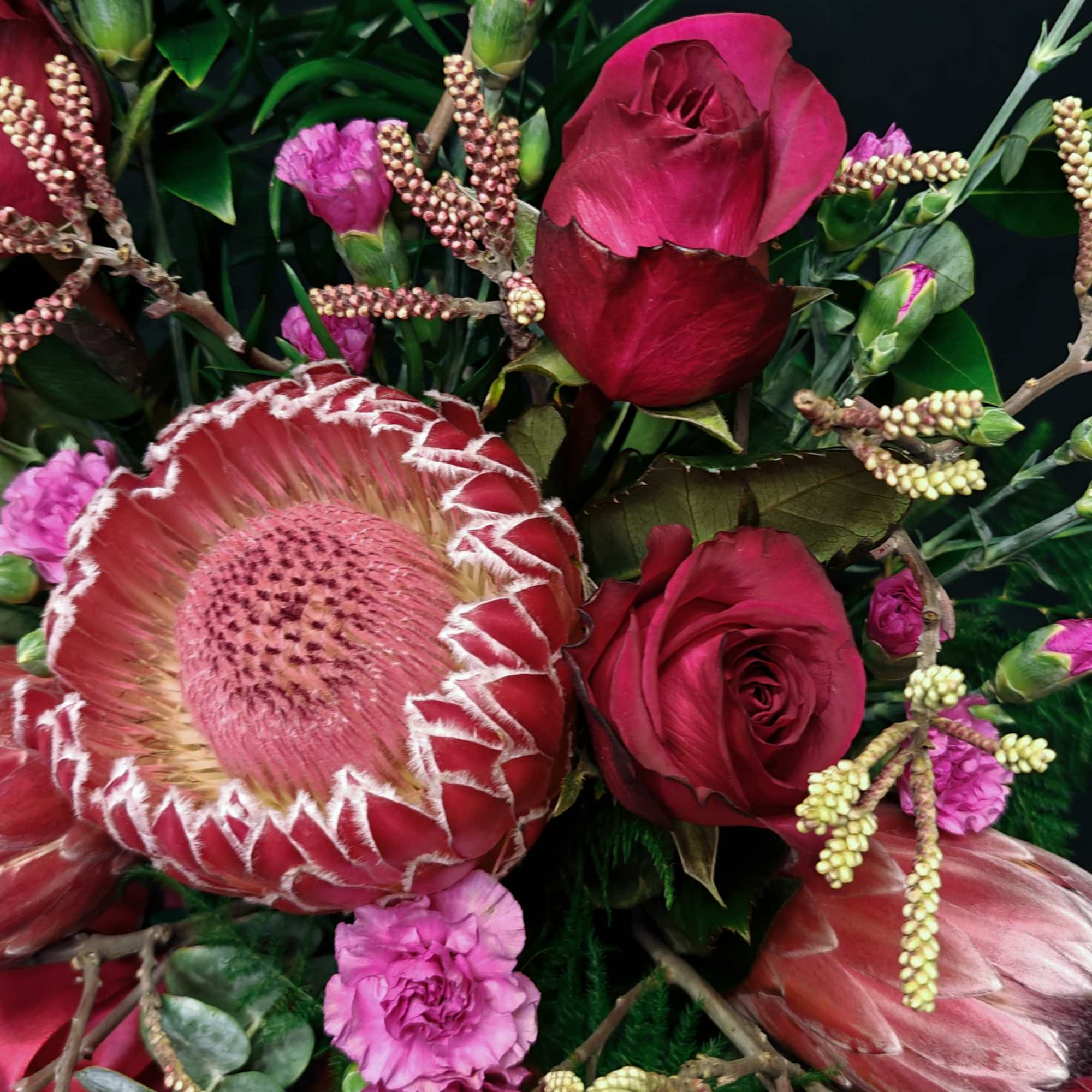 A medium size exotic bouquet.  Big beautiful African protea (exact variety