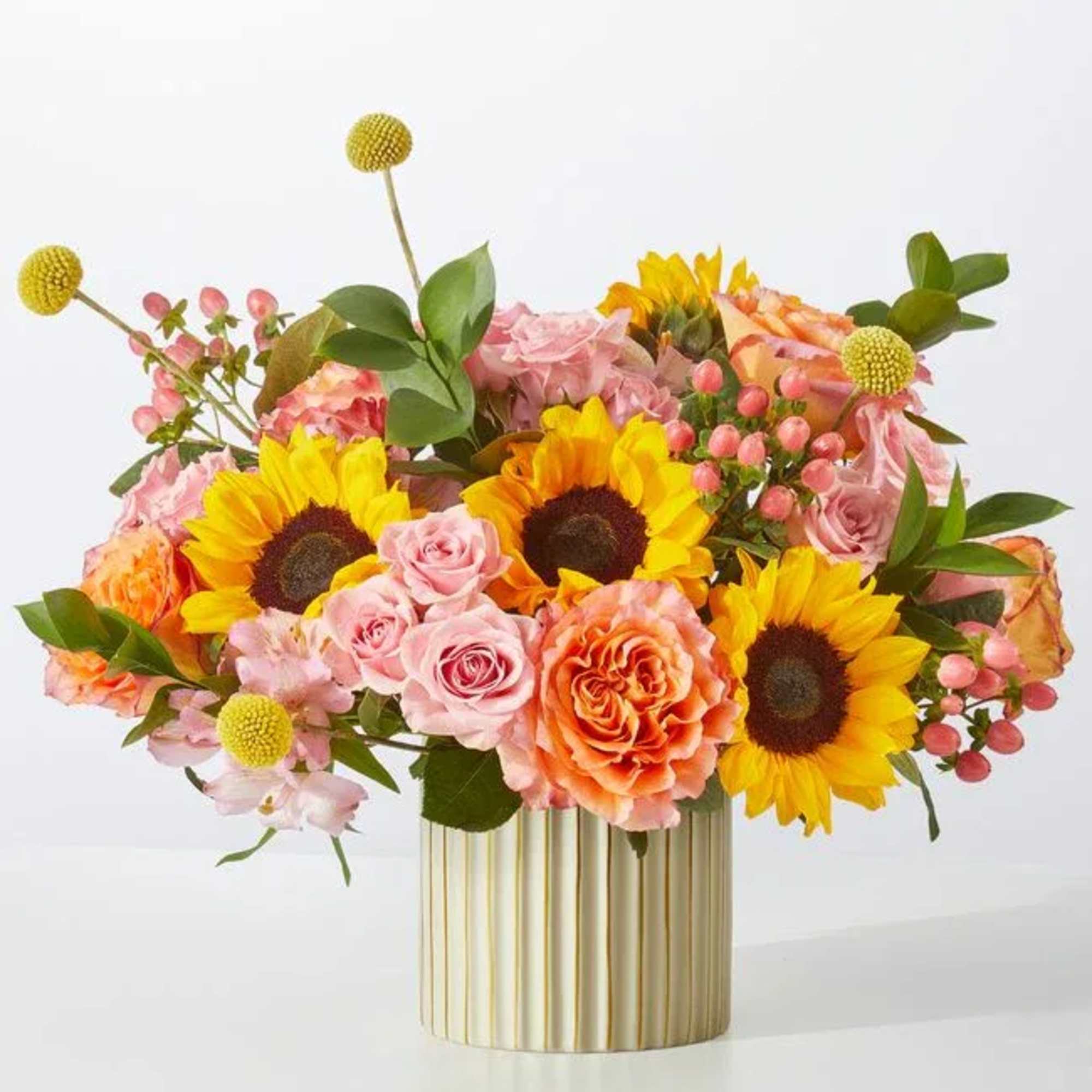 A combination as sweet as citrus, these peach, orange and yellow blooms