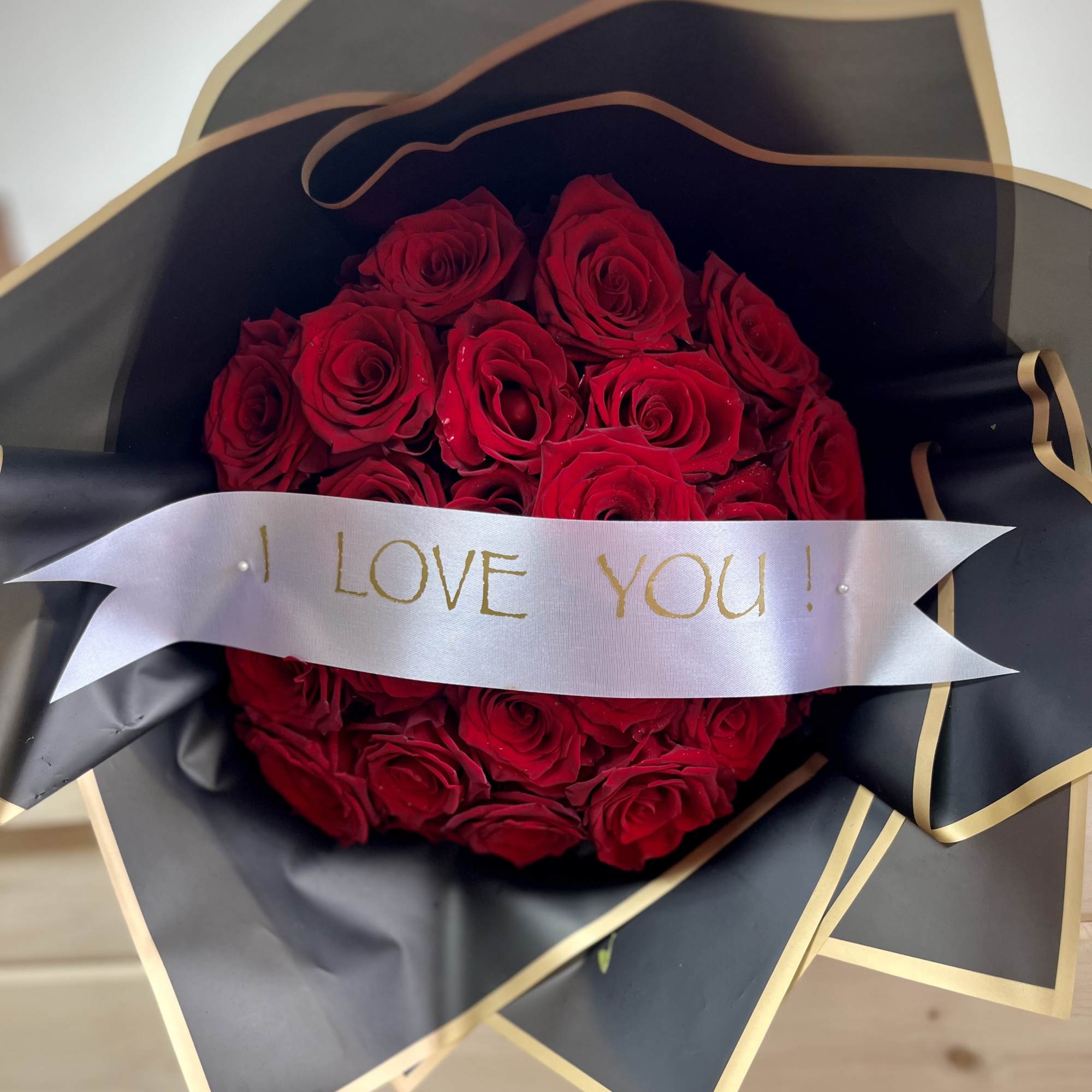 Bouquet of 24 premium long stem Red Roses can be done in