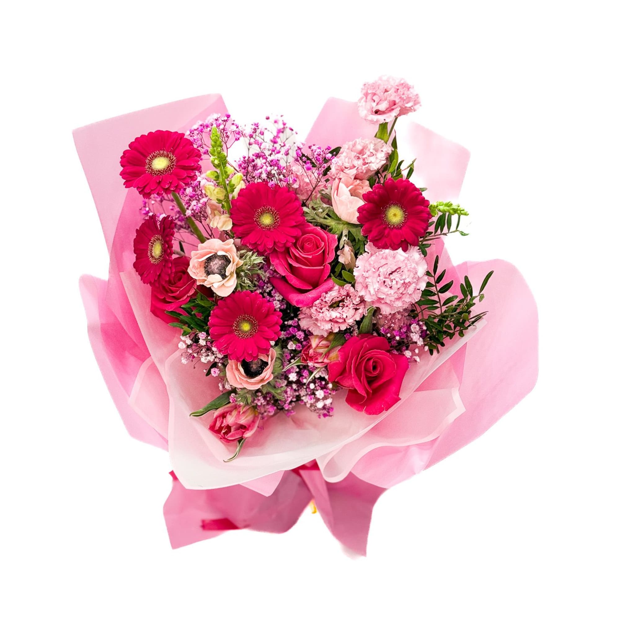 Pink bouquet with roses, gerbera daisies, and carnations wrapped in pink paper