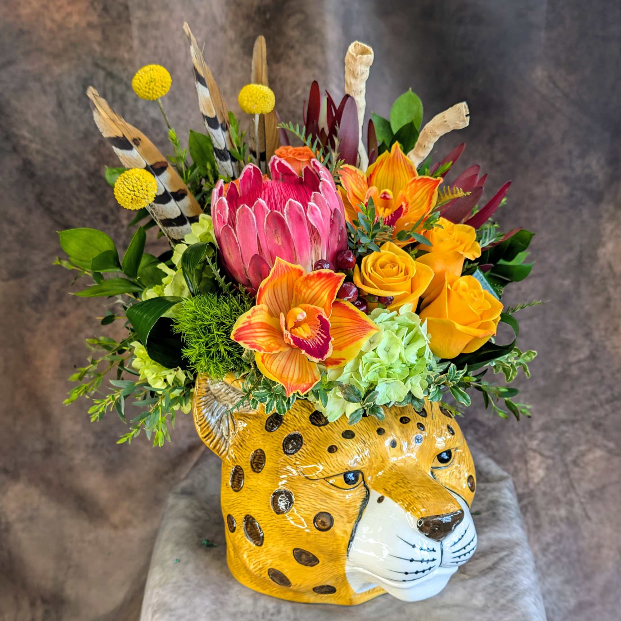 Bold. Wild. Unapologetically beautiful.

Untamed is a striking, safari-inspired floral design created for