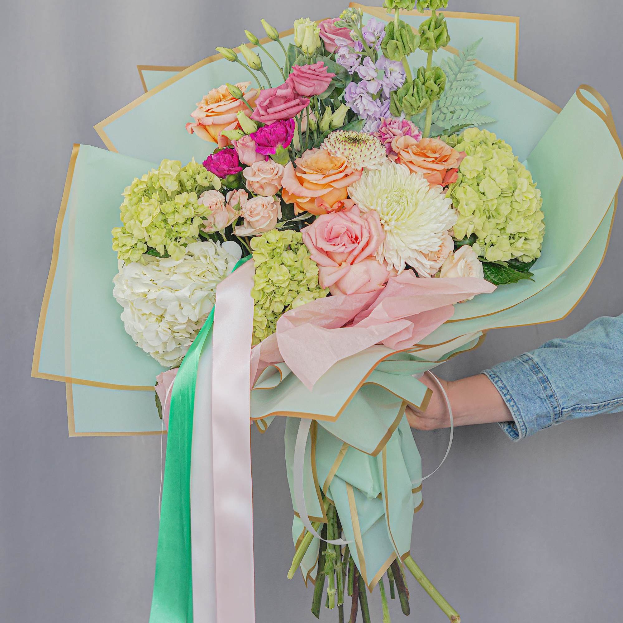 This elegant bouquet is wrapped in premium Korean-style paper and designed with