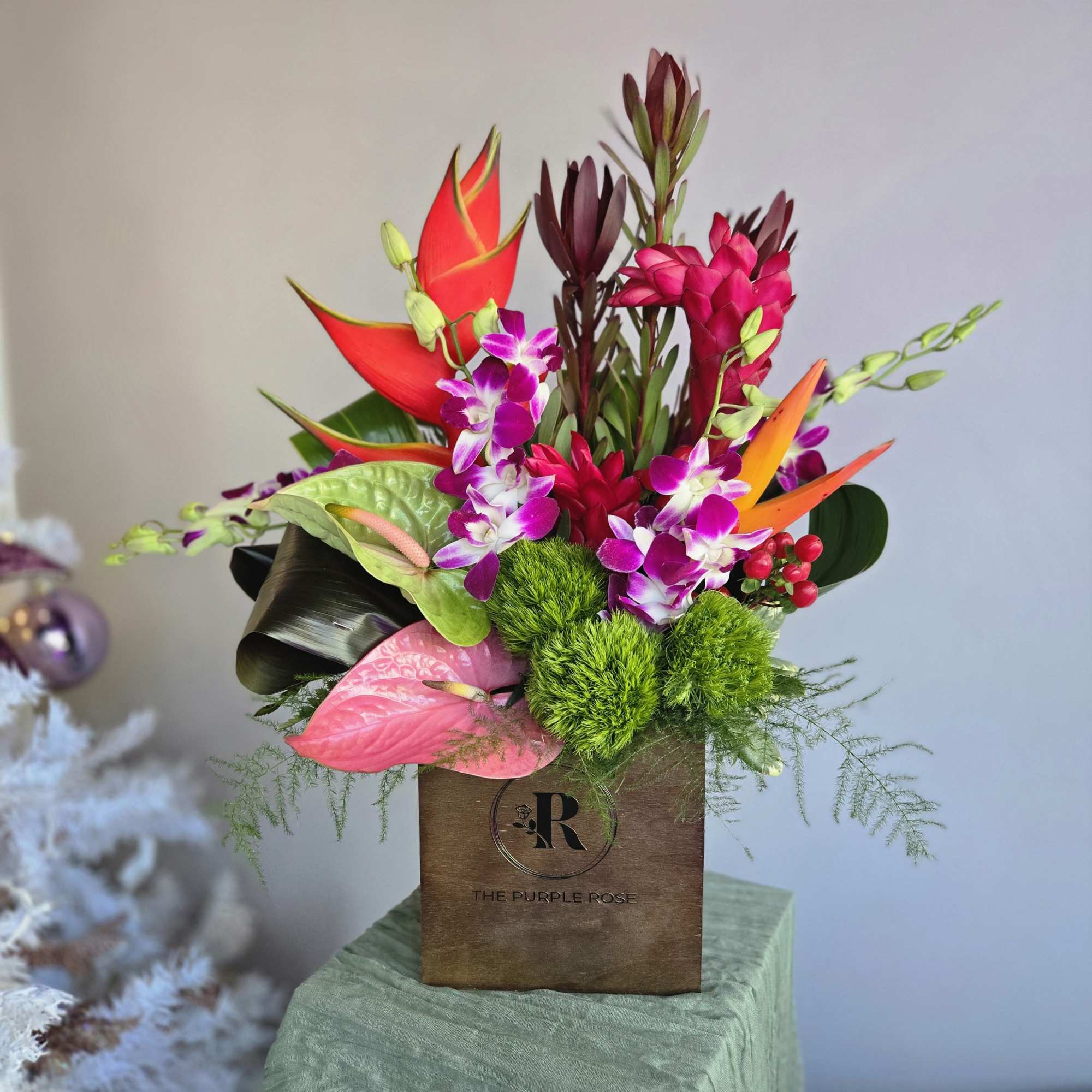 This tropical arrangement is perfect for your traveling friend, business partner, or