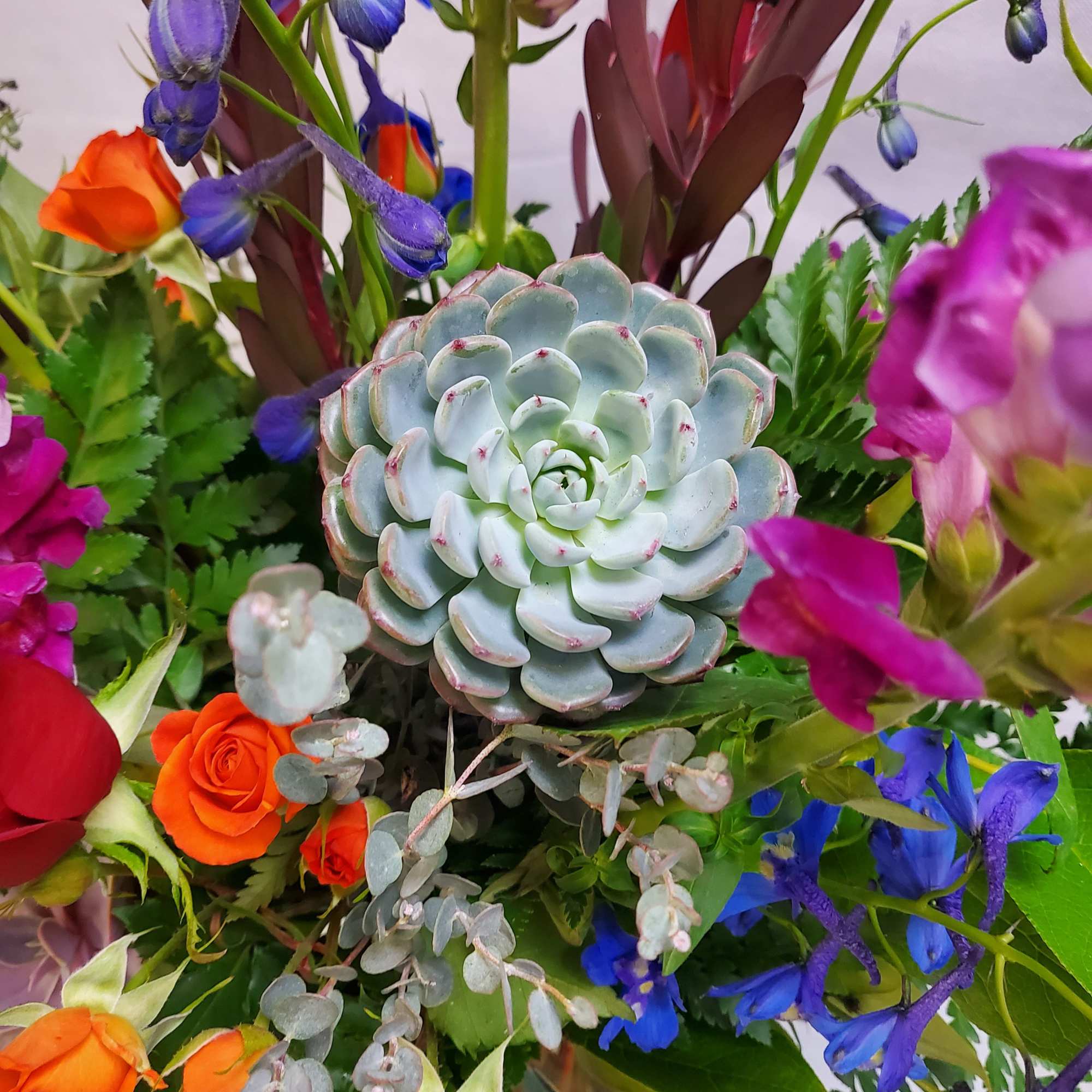 Gorgeous assortment of desert flowers!
Roses, Snapdragons &amp; Succulents.
