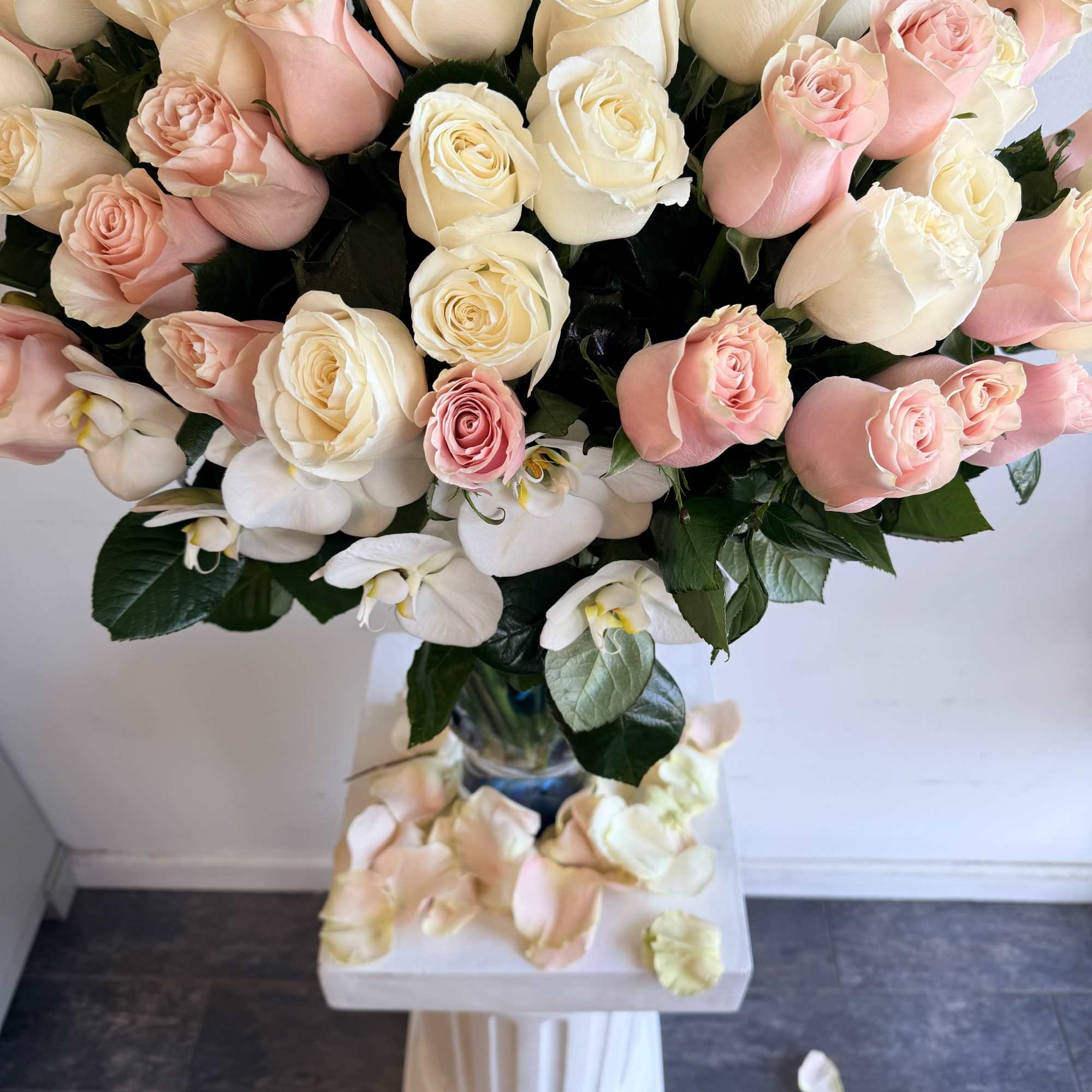 Luxury vase with a favorite touch of pink and white roses, perfectly