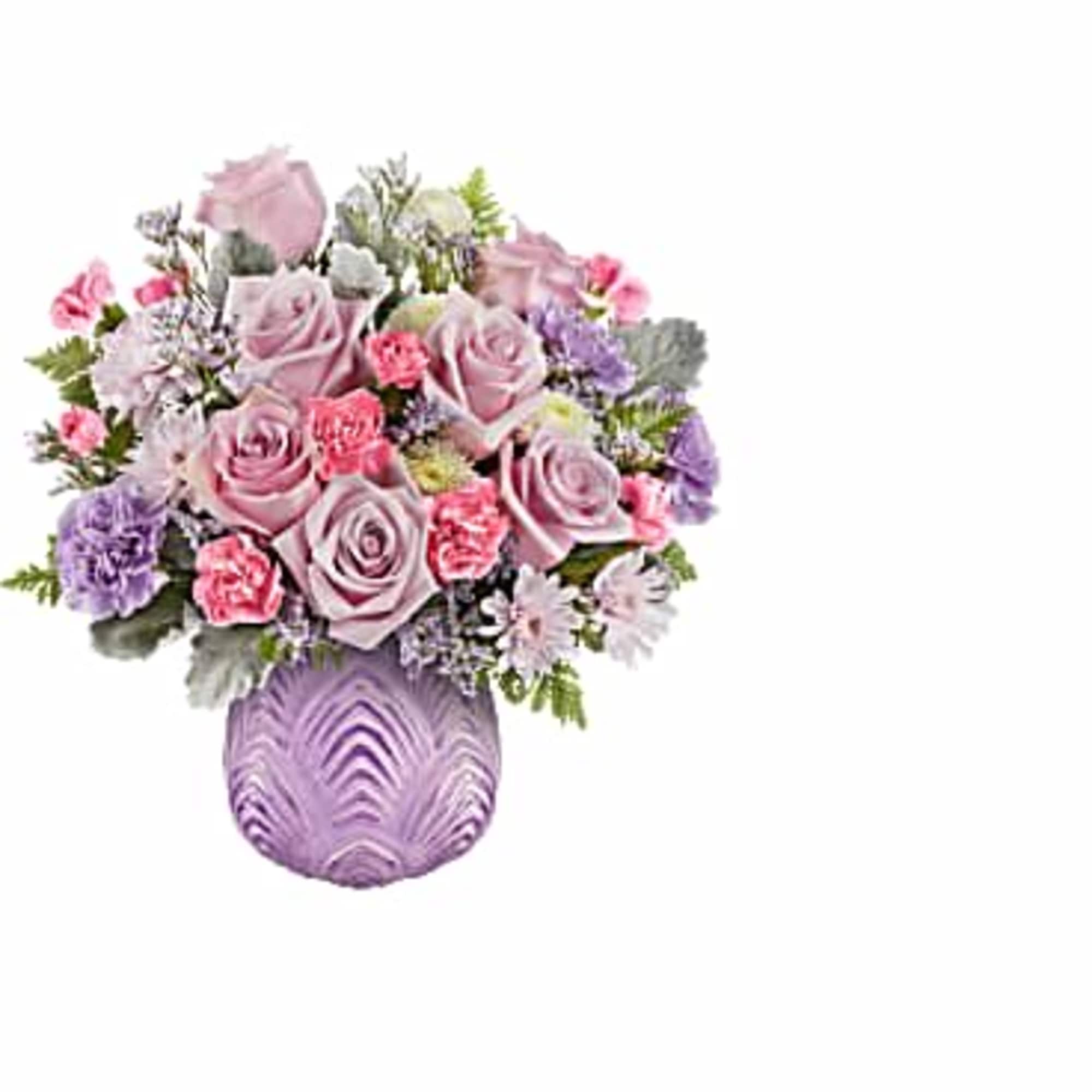 Dreamy blooms! This stylish bouquet, featuring delicate pinks and shimmering lavenders, looks