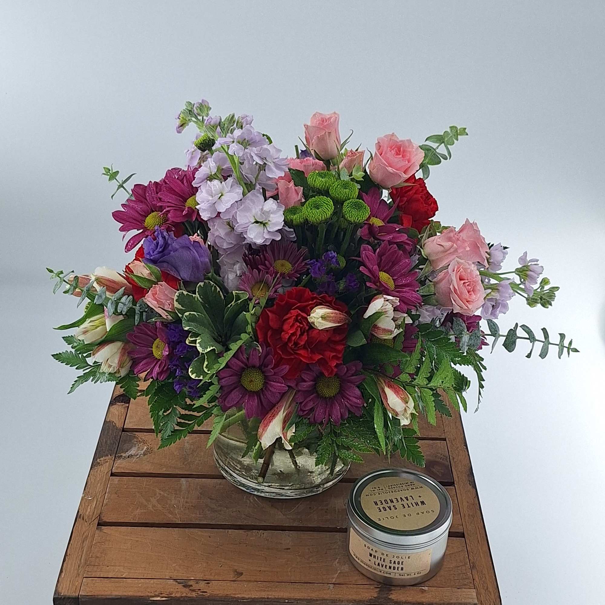 Delight your sweetest loved one with a radiant bouquet of jewel-toned spray