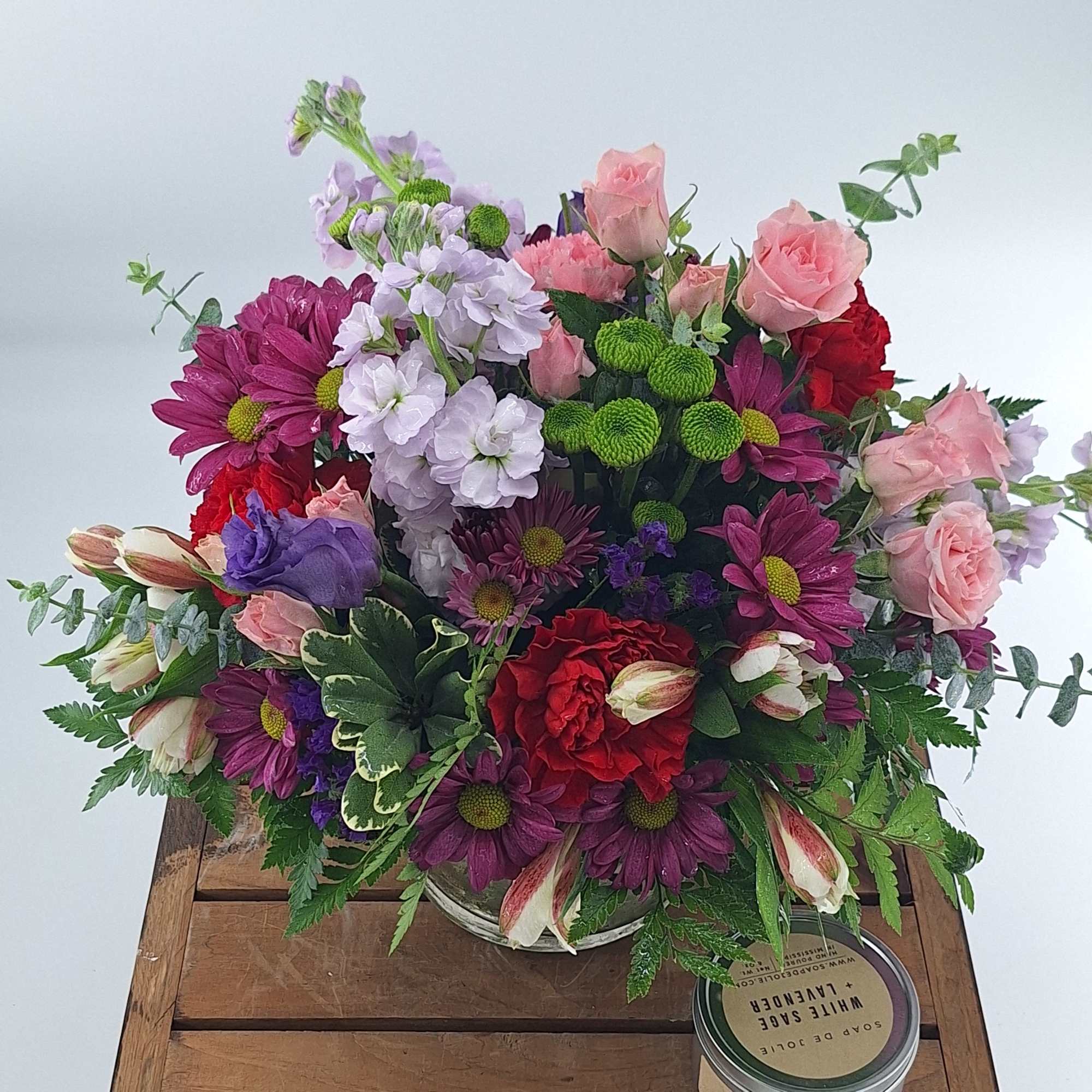 Delight your sweetest loved one with a radiant bouquet of jewel-toned spray