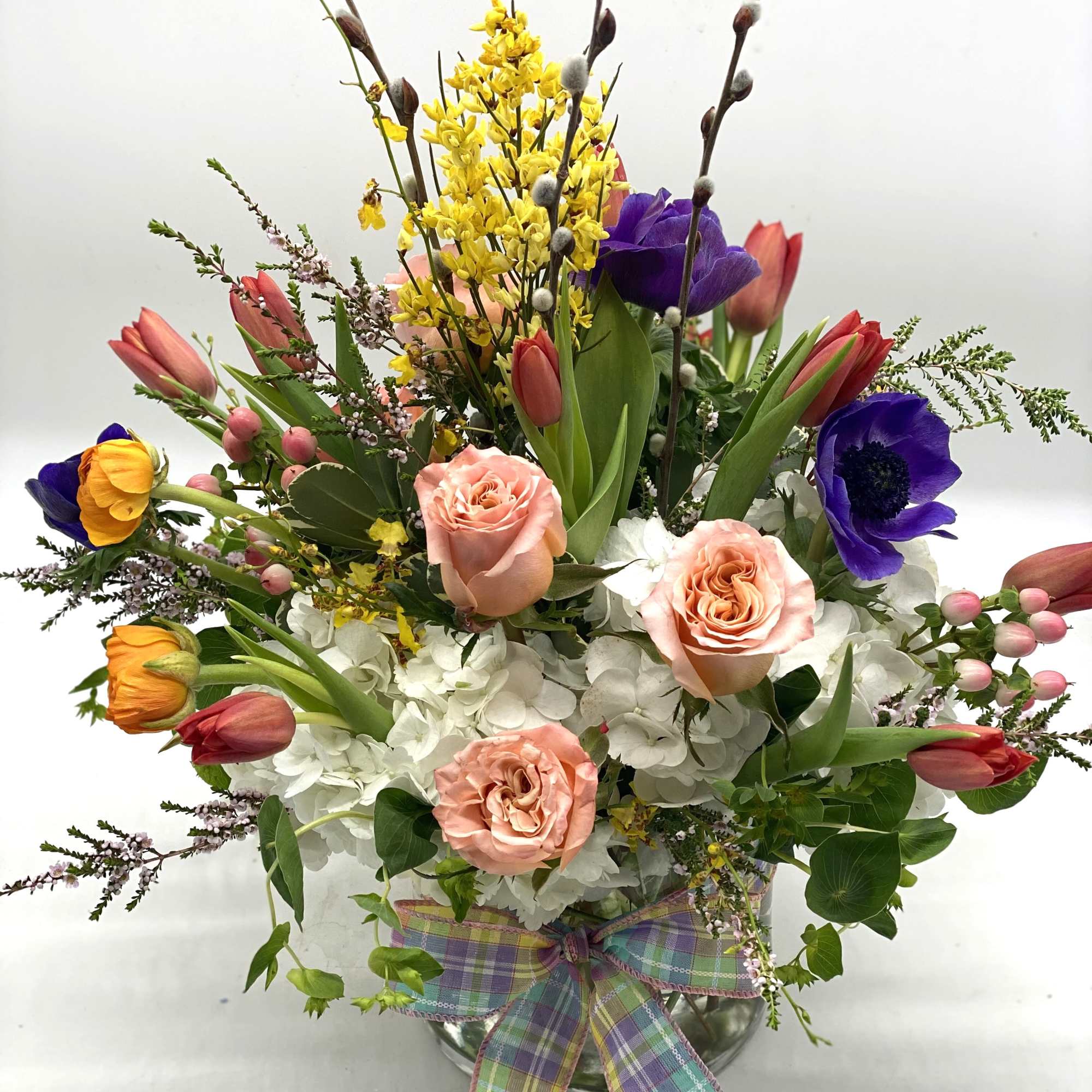 A lush mix of fresh spring blooms! Looks beautiful and smells even