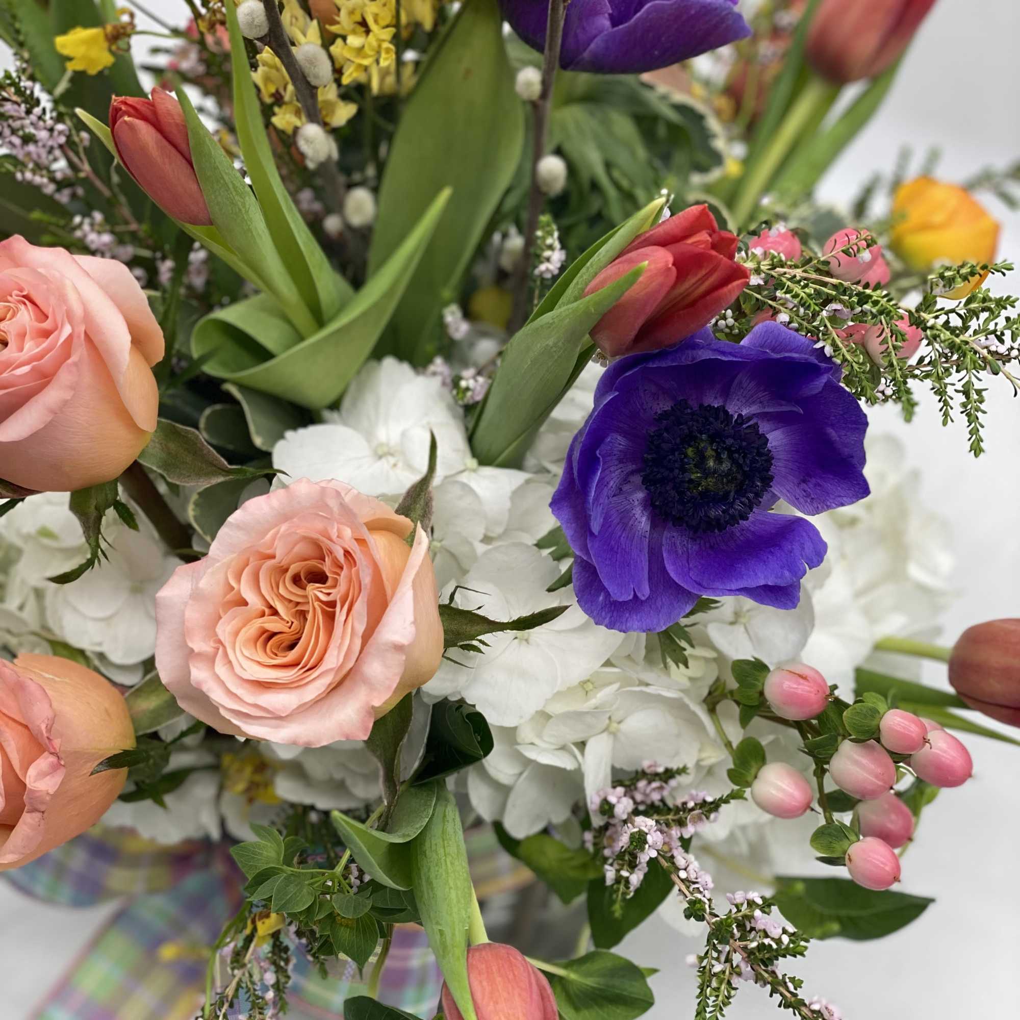 A lush mix of fresh spring blooms! Looks beautiful and smells even