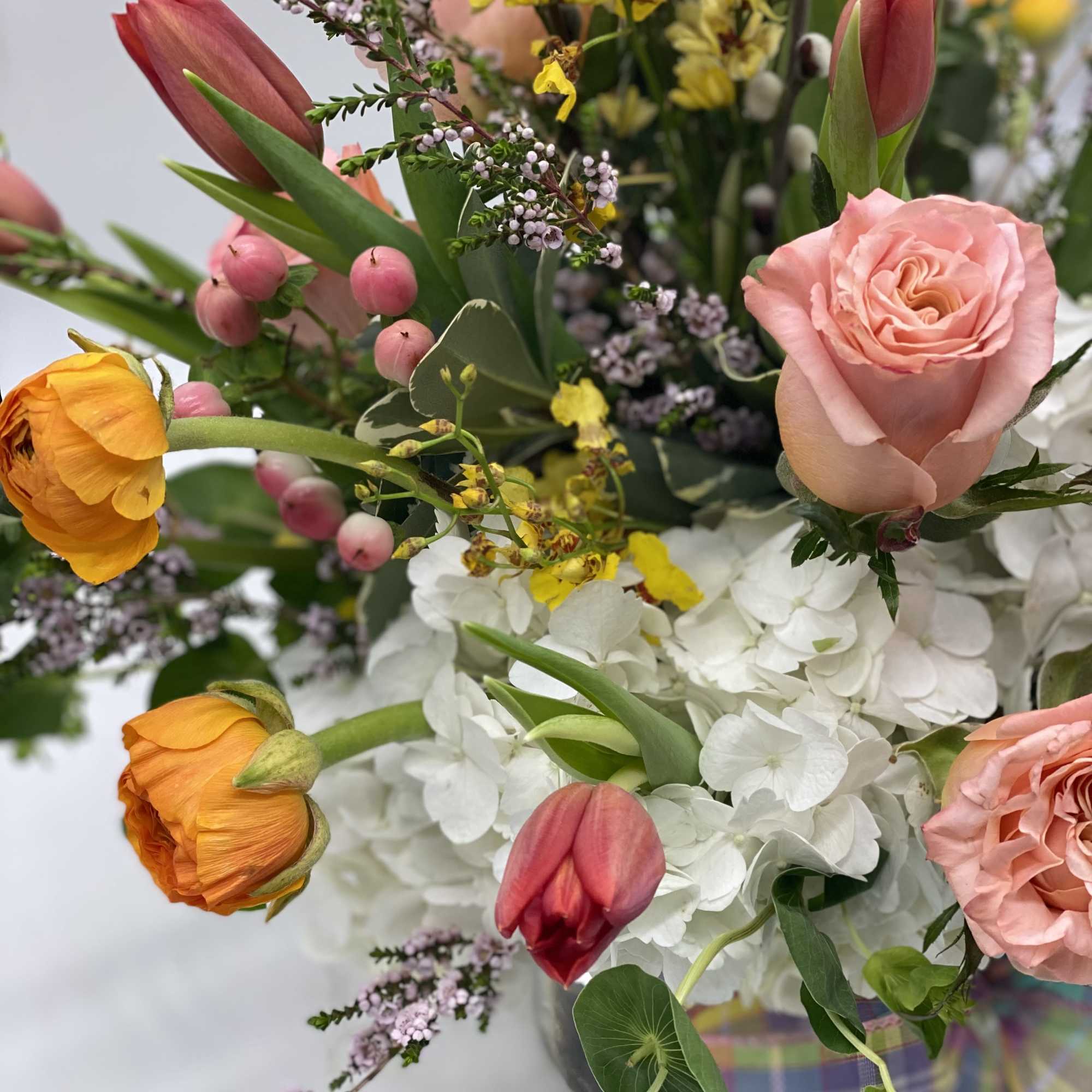 A lush mix of fresh spring blooms! Looks beautiful and smells even