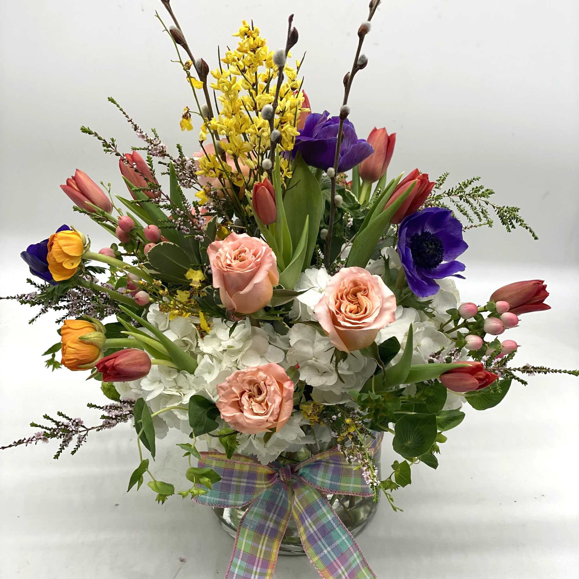 A lush mix of fresh spring blooms! Looks beautiful and smells even