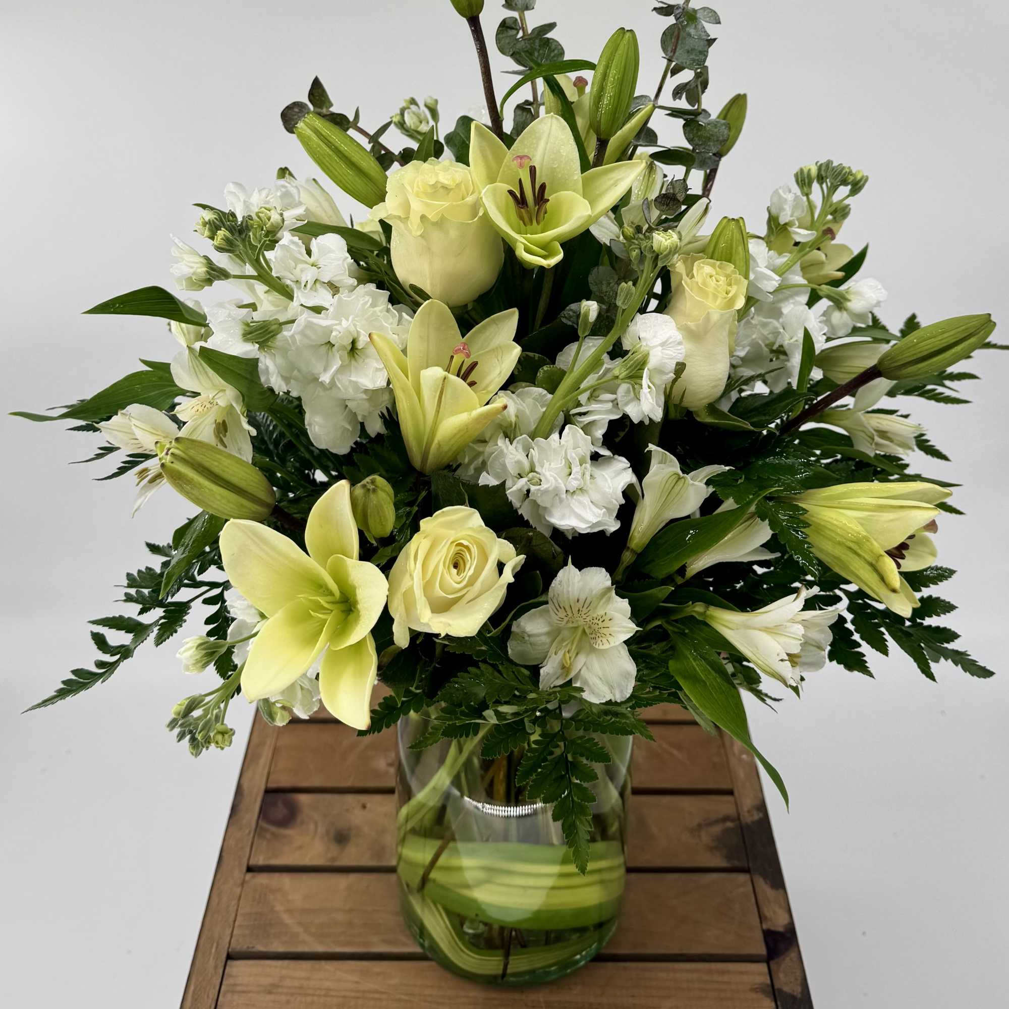 Introducing the "Eternal Rest" arrangement, a serene and heartfelt tribute to honor