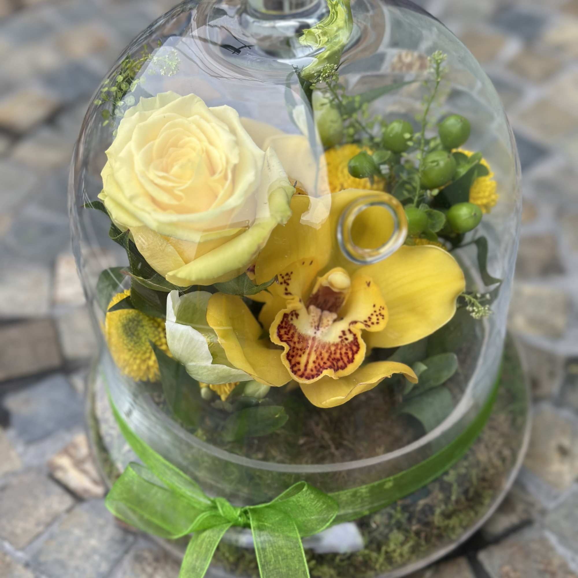 A touch of fairy magic captured under glass. Tinkerbell is a whimsical