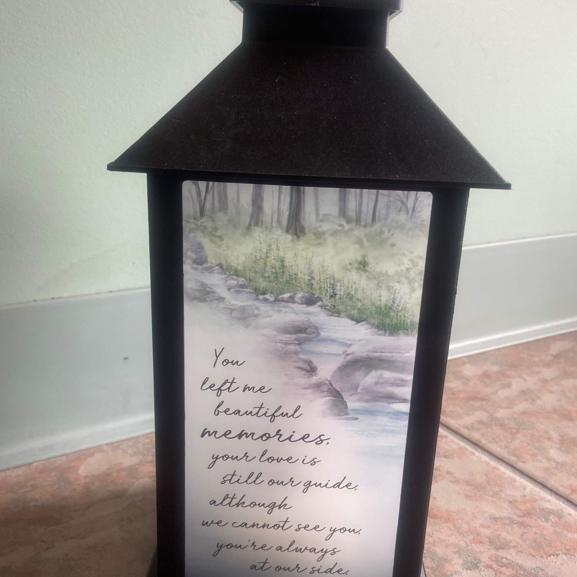 This beautiful black high quality polyresin finish lantern surrounds an interior of