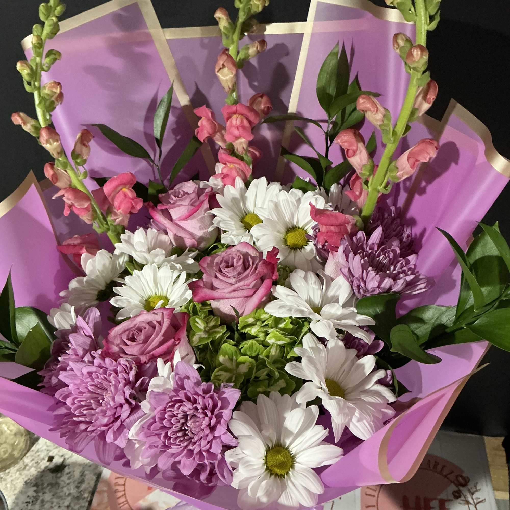 This purple floral arrangement it&rsquo;s perfect gift for women day or any