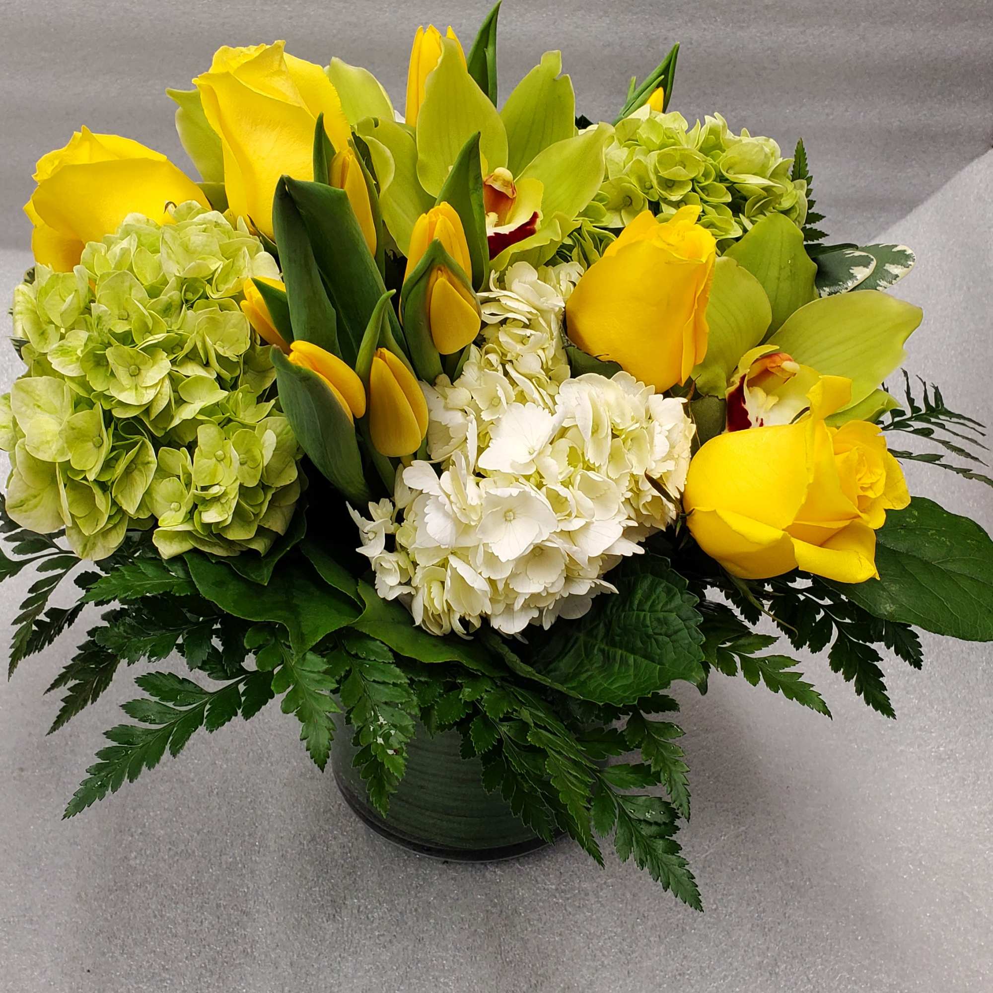 Bright yellows and greens designed in a  a low and lush