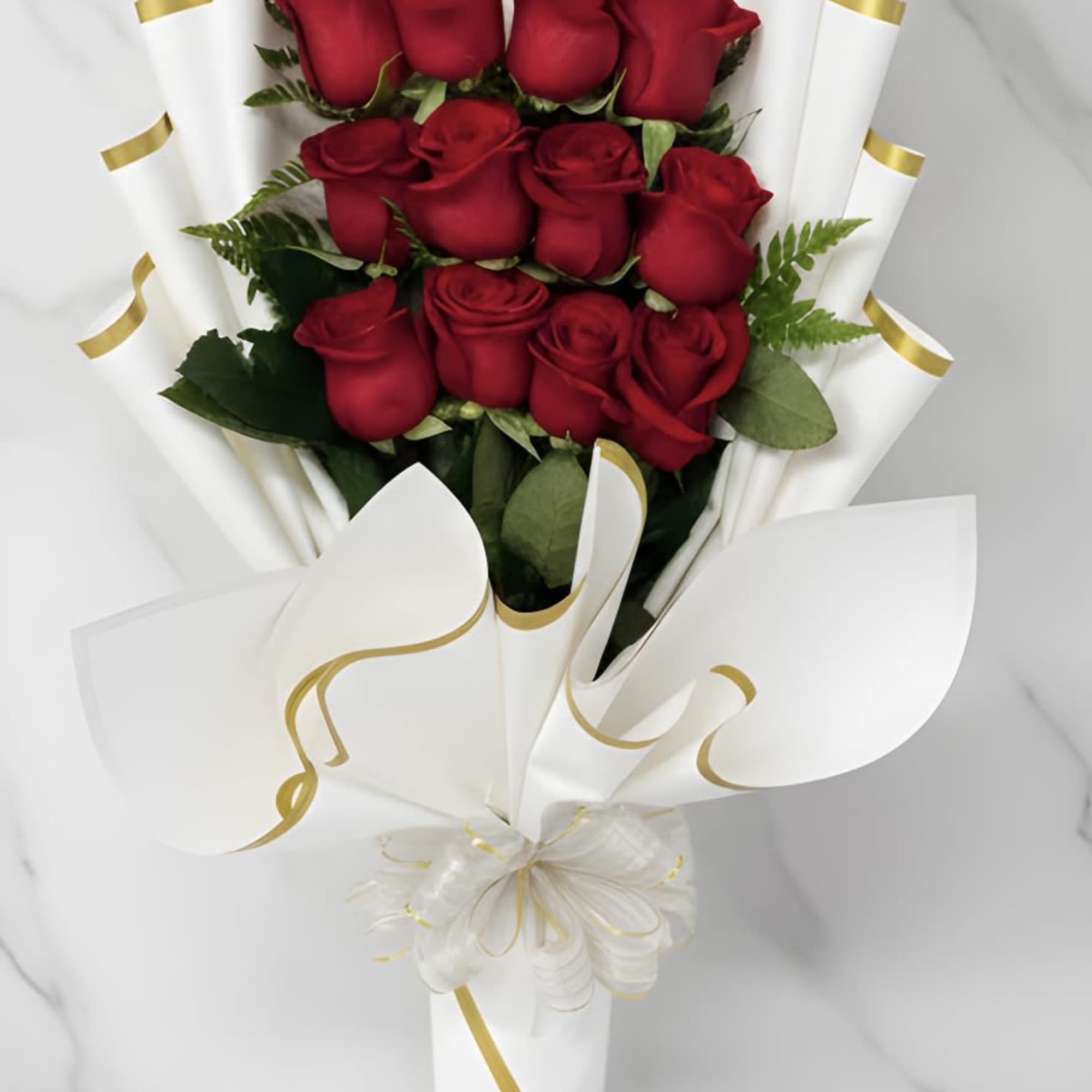 This is a stunning presentation of deep red roses, symbolizing passion and