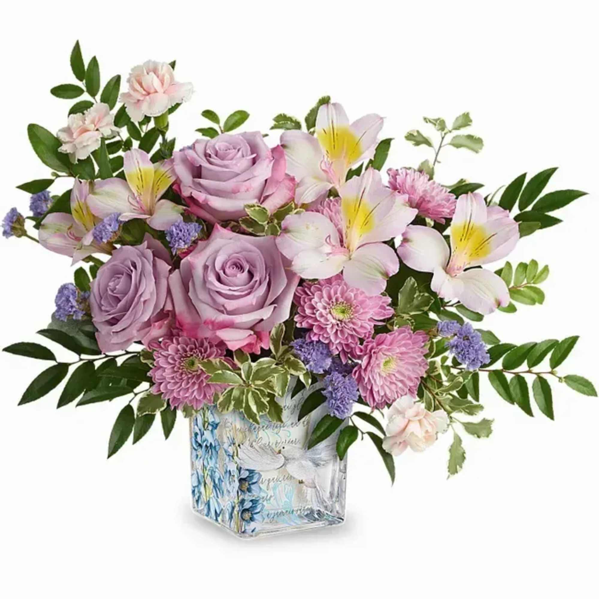 Lavender roses and pink lilies in a decorative glass vase
