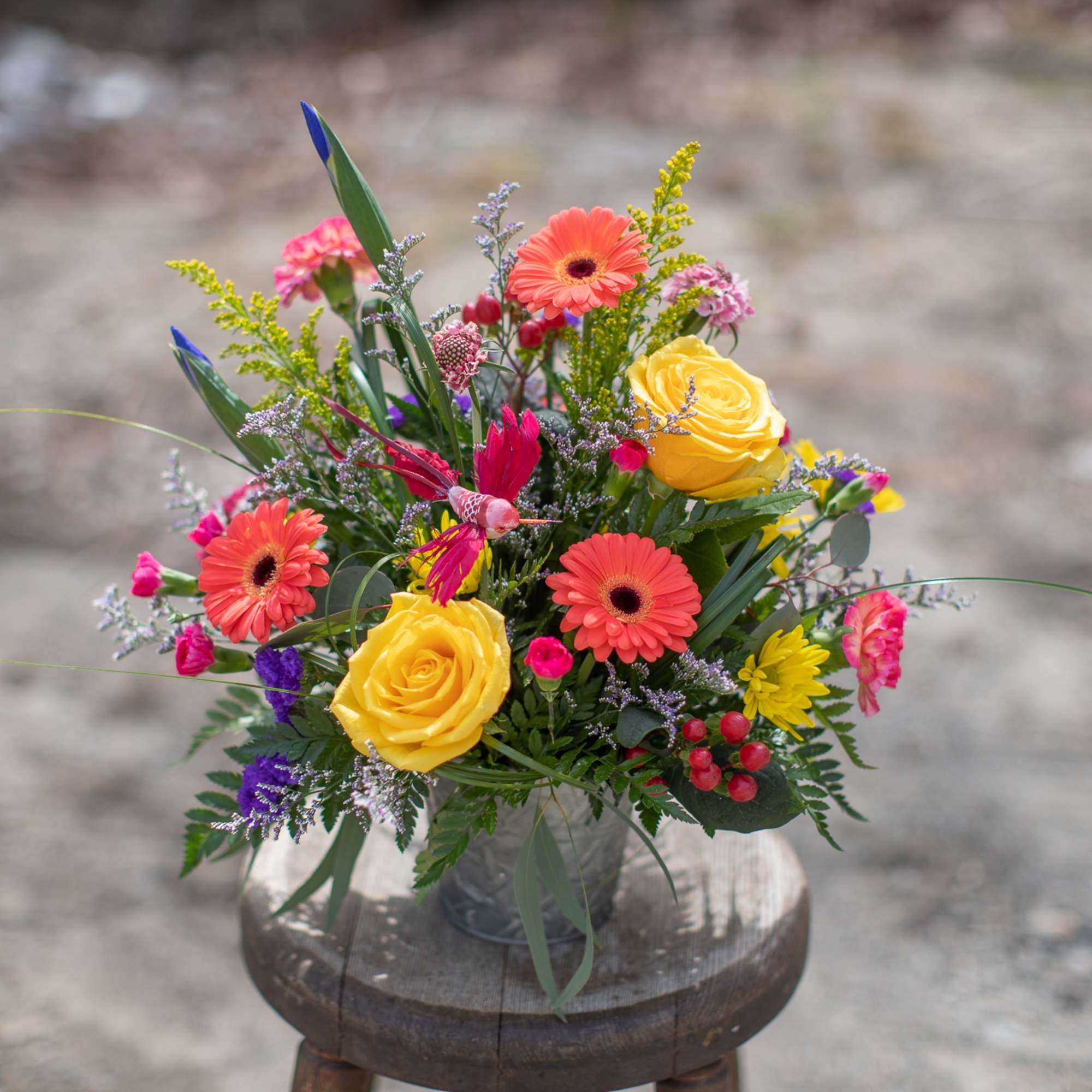 Colorful mixed bouquet in a clear glass vase