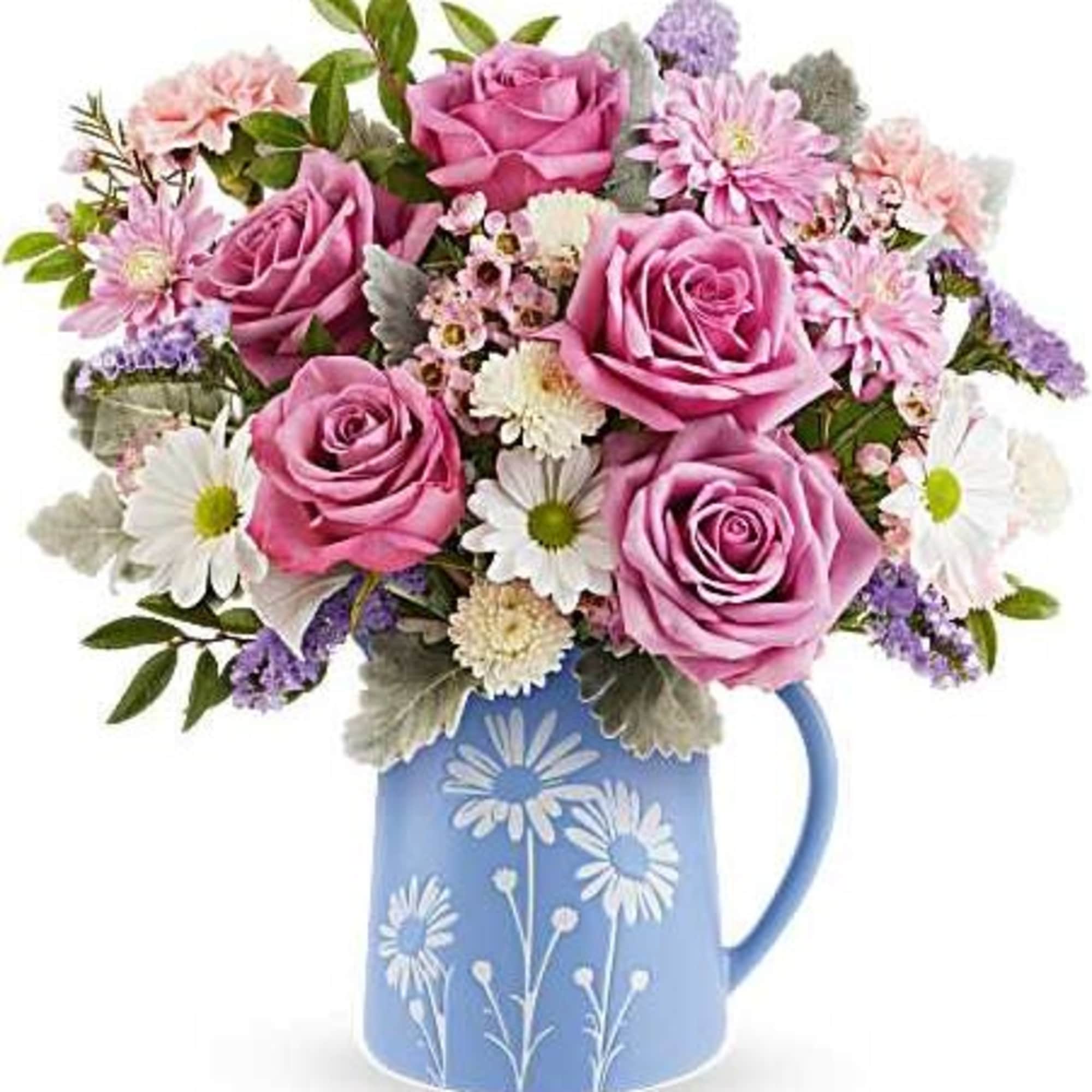 Soft and serene, Teleflora's Pastel Meadow Bouquet brings the beauty of a