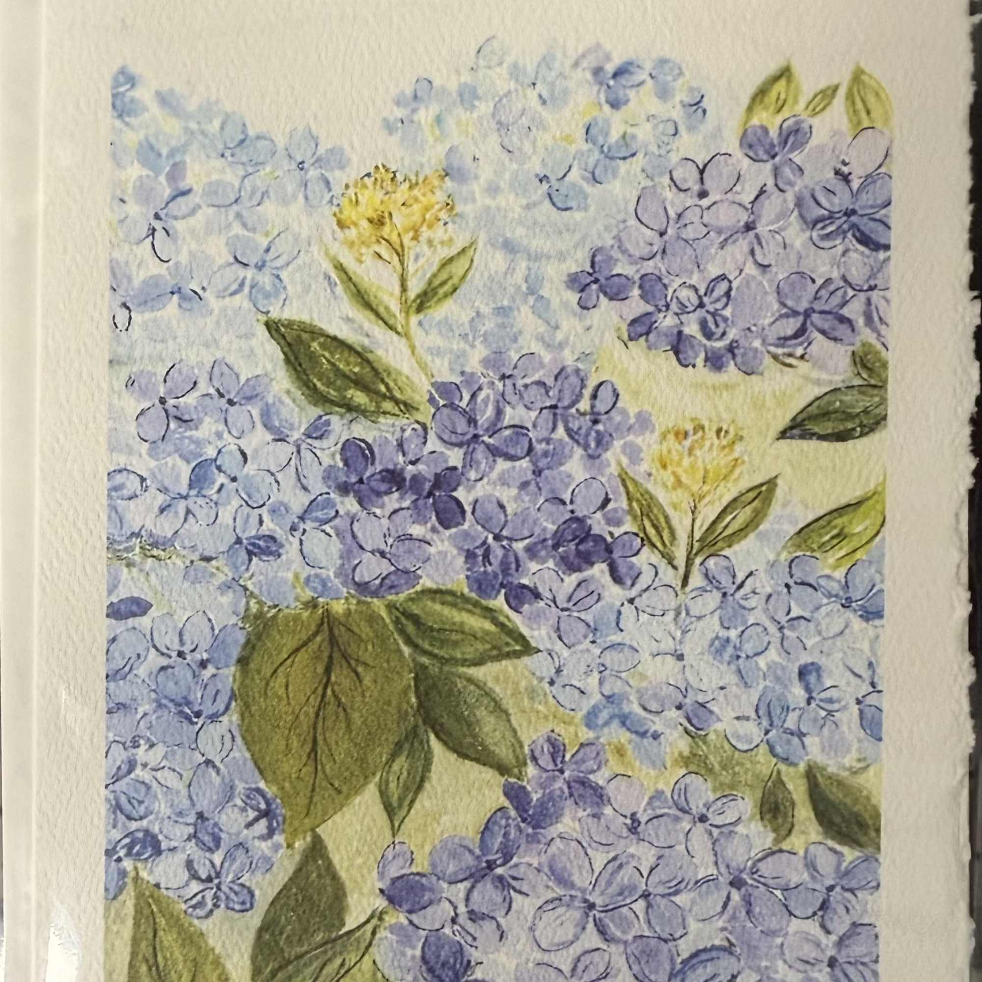 These beautifully curated baskets include hydrangea-inspired gifts such as tea towels, mugs