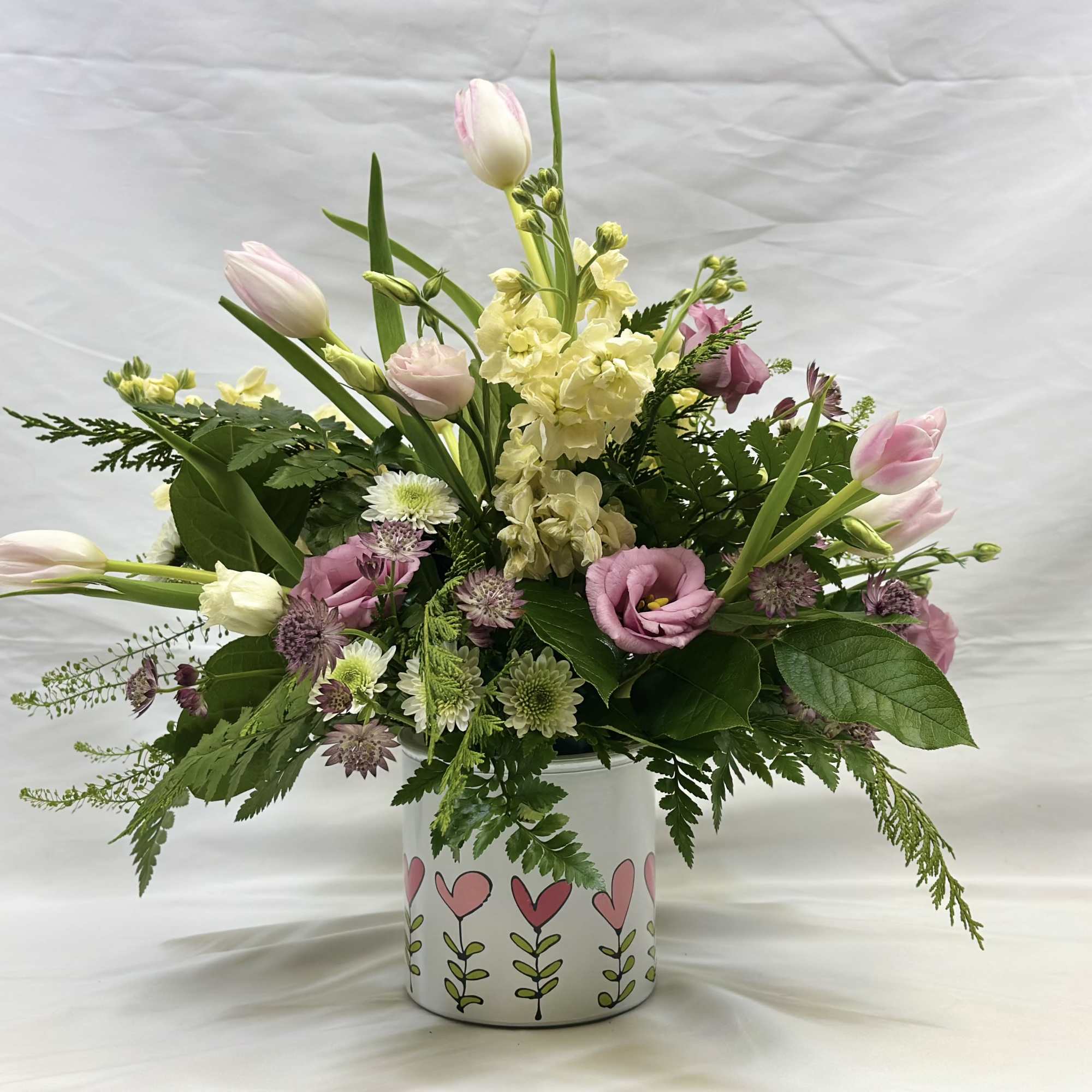 This Leary's Flowers exclusive design captures the beauty and elegance of Spring