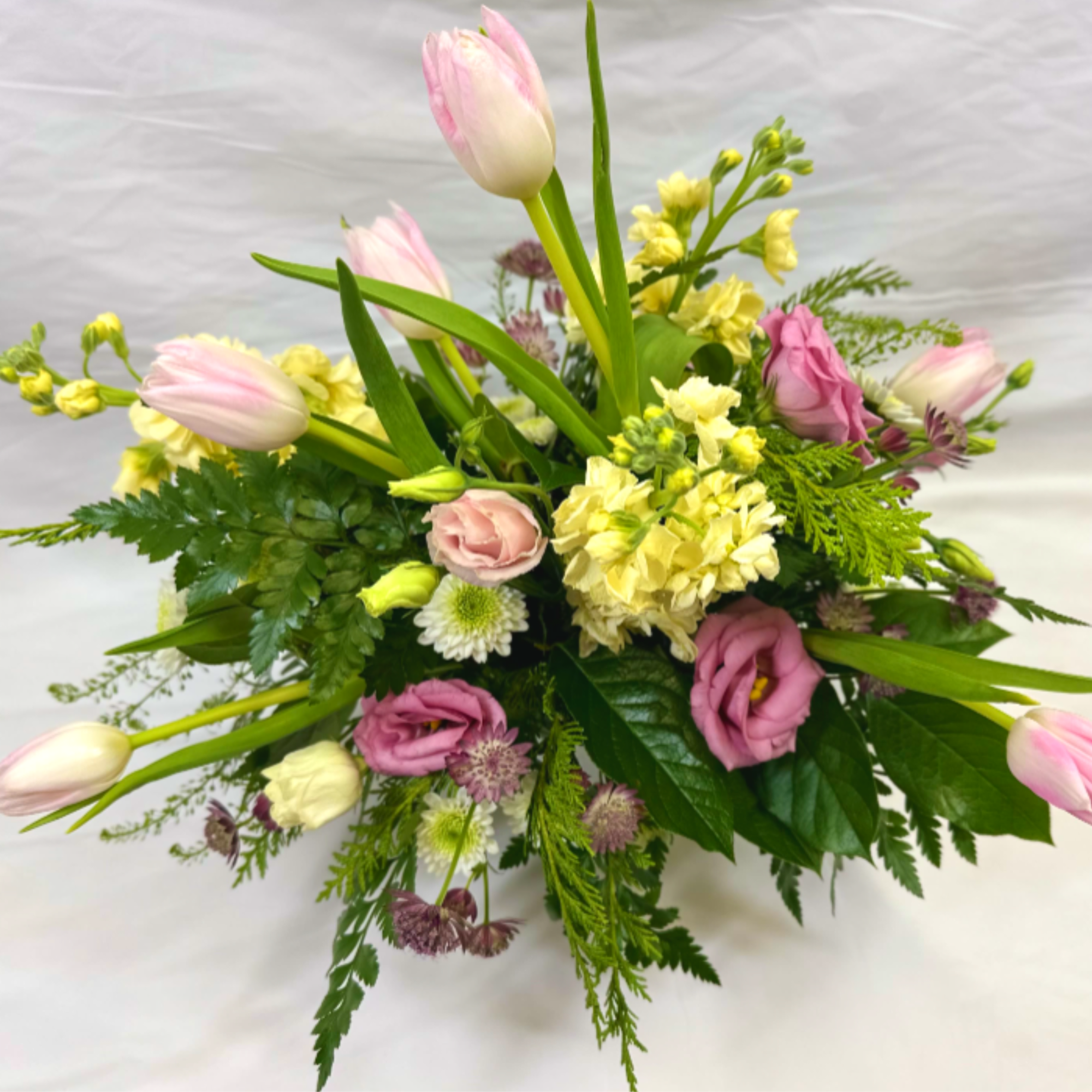 This Leary's Flowers exclusive design captures the beauty and elegance of Spring
