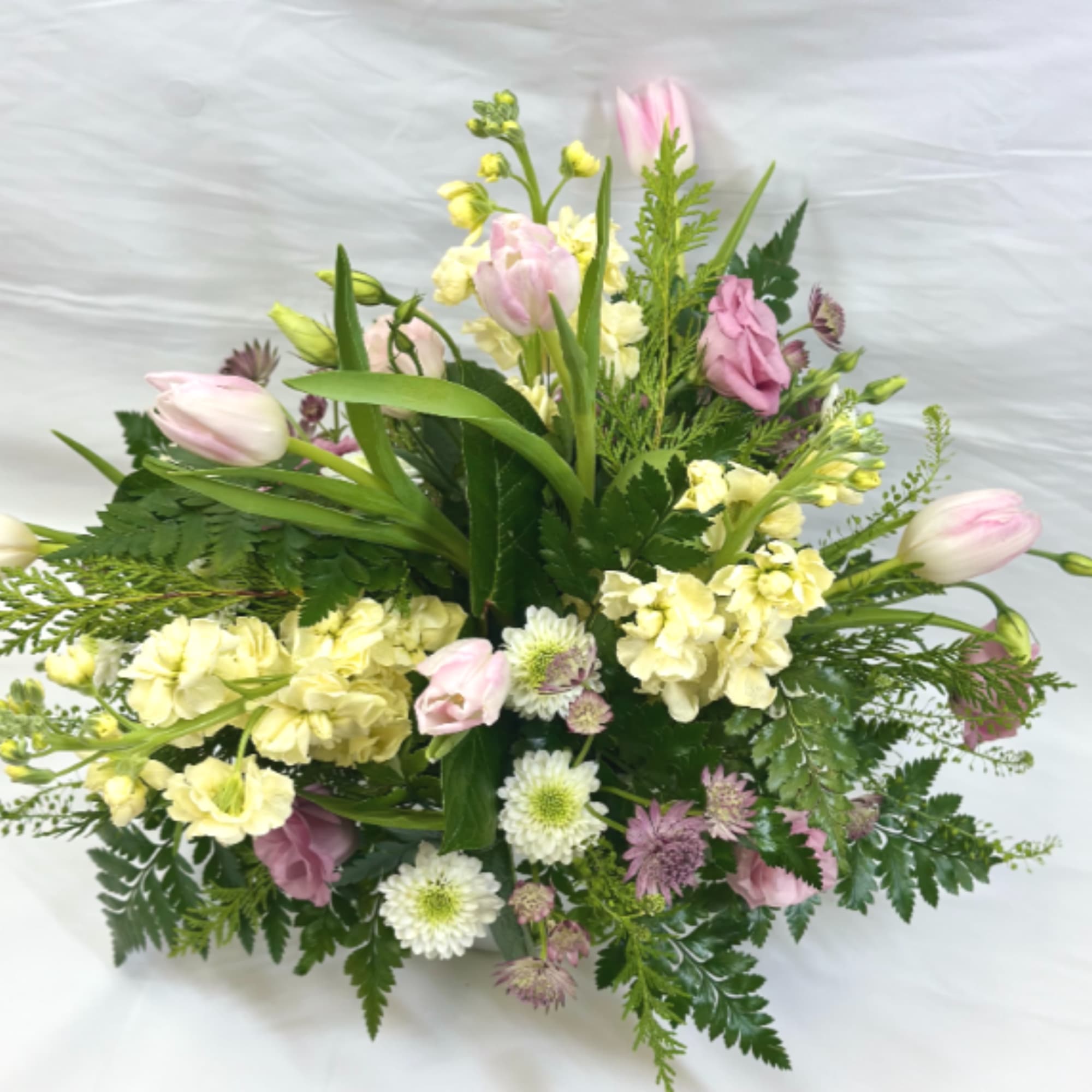 This Leary's Flowers exclusive design captures the beauty and elegance of Spring